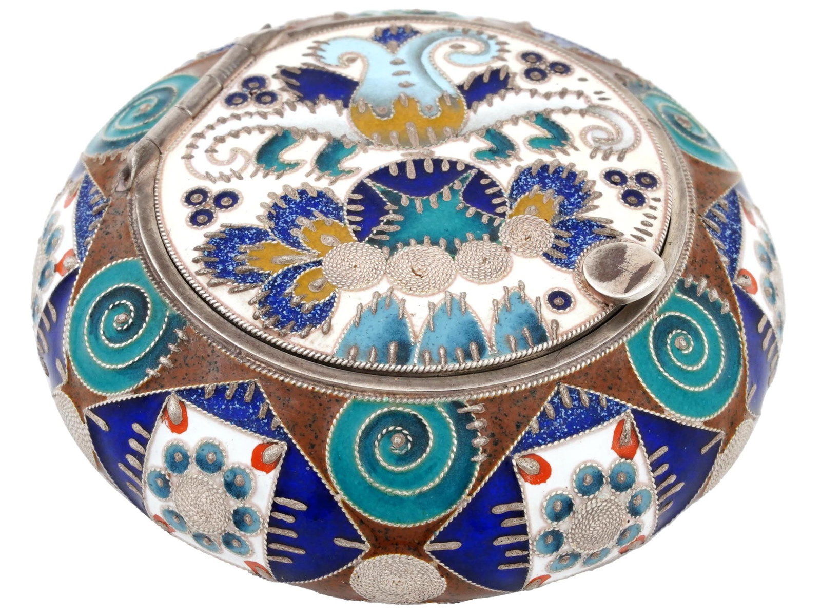 RUSSIAN 88 SILVER AND CLOISONNE ENAMEL PILL BOX: A Russian round shaped pillbox made in silver, skillfully decorated with shaded cloisonne enamel. The exterior of the box is enameled with brown, ochre, aquamarine, blue, white and red neo Russian geo