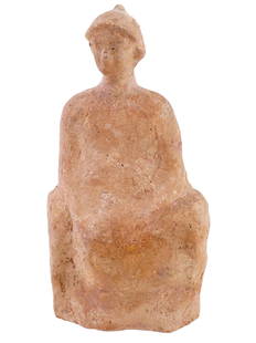 ANCIENT GREEK CERAMIC FIGURINE FROM TANGARA: An ancient Greek ceramic figurine from Tangara depicting a seated female. Presumably 5th century BC. Tanagra figurines are the most common type of ancient Greek terracotta figurines of the Hellenistic