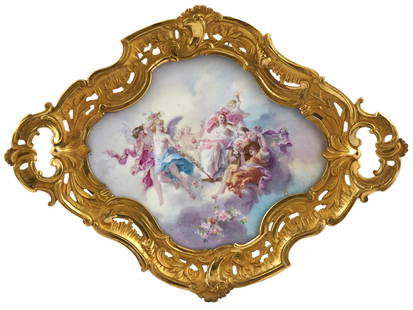 ANTIQUE FRENCH GILT BRONZE SEVRES PORCELAIN PLAQUE: An antique French Sevres porcelain plaque. Sevres porcelain is renowned for its quality and craftsmanship, and this plaque exemplifies the artistry of the era. The porcelain plaque is adorned with a m