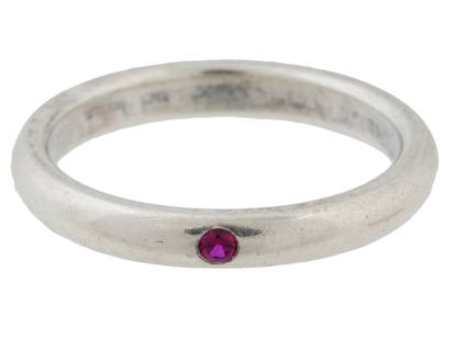 VINTAGE TIFFANY ELSA PERETTI STERLING SILVER RUBY RING: A vintage Tiffany and Co. Elsa Peretti sterling silver ring set with a ruby stone representing a beautiful and stylish piece of jewelry. Elsa Perettis designs for Tiffany and Co. are known for their