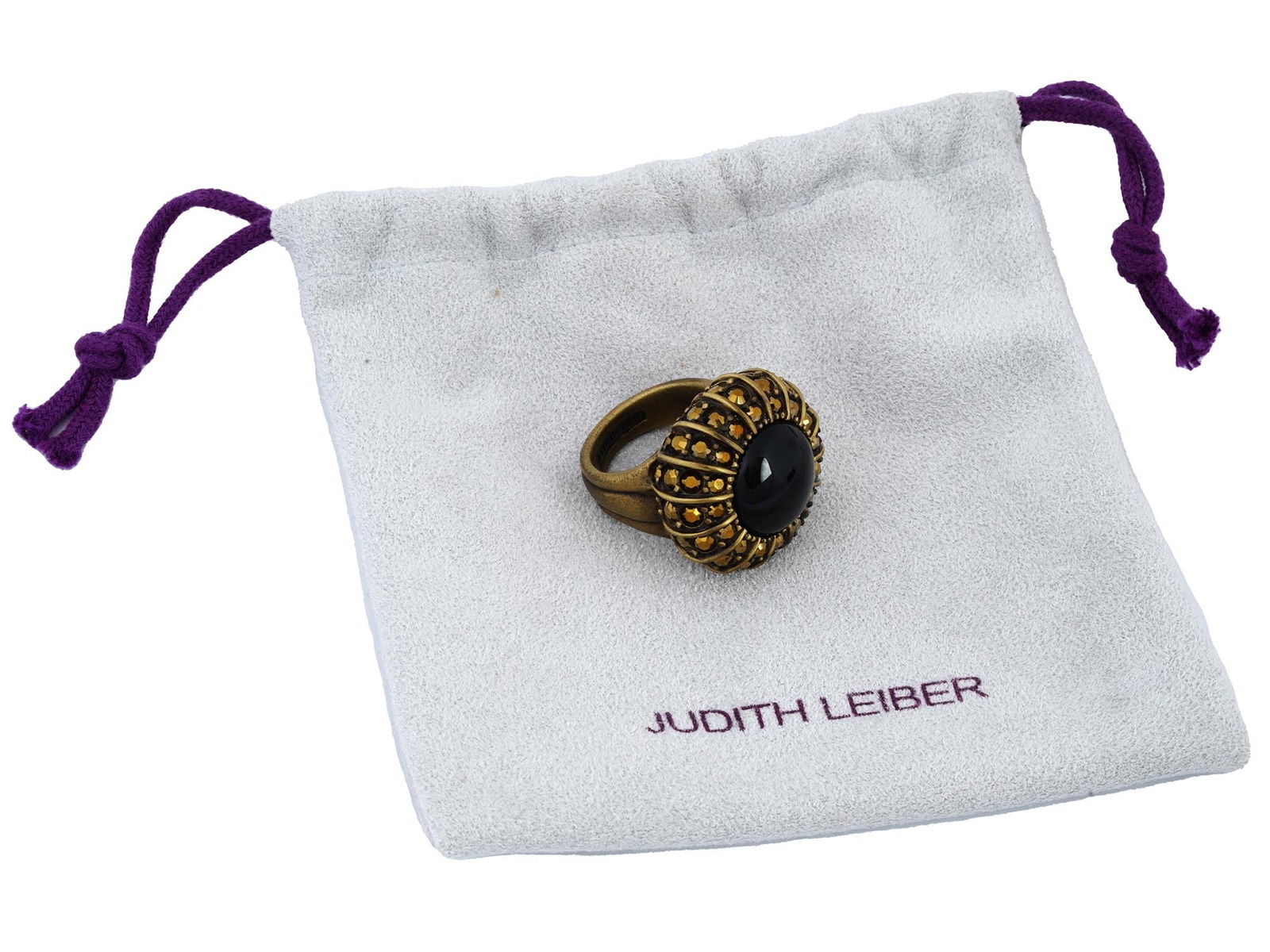 JUDITH LEIBER AVA CABOCHON AND PAVE DESIGNERS RING: A Judith Leiber designers ring decorated with a large round black cabochon and pave crystals. Comes with a branded pouch. Judith Leiber is an American luxury brand established in 1963. Vintage Costume