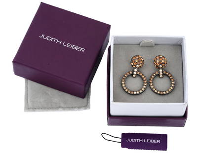JUDITH LEIBER COCO PAVE DOOR KNOCKER EARRINGS: A Judith Leiber Coco door knocker earrings set with Pave crystals. The piece comes in its original box, the label is preserved. Judith Leiber is an American luxury brand established in 1963. Vintage C
