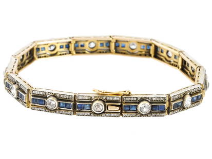 ANTIQUE RUSSIAN GOLD DIAMONDS AND SAPPHIRES BRACELET: An impressive antique Russian Art Deco bracelet made of 14K gold and set with diamonds and sapphires. Diamonds 4 carats; Sapphires 52 pcs. approx. 4.50 carats, a total of 8.5 Carats. Hallmarked on the