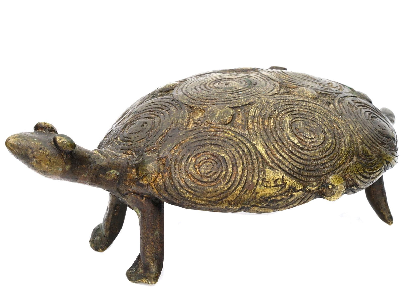 VINTAGE PRIMITIVE GILT BRONZE TORTOISE PAPERWEIGHT: A vintage gilt bronze figurine representing a tortoise. Swirl shell pattern. The item may serve as a paperweight. Collectible Decor And Sculpture, Desk Accessories, Animalia. Dimensions: L 5 1/4 in. A
