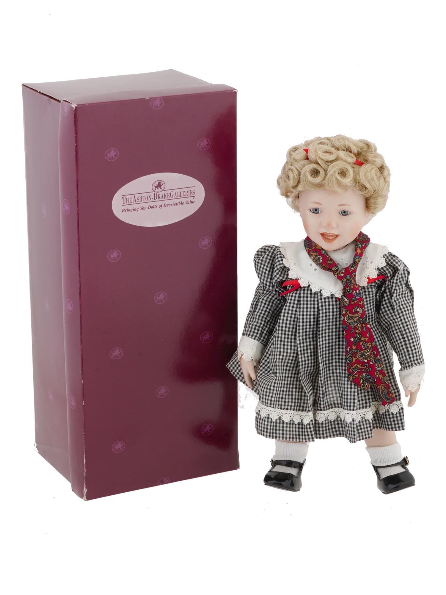 THE ASHTON DRAKE GALLERIES PORCELAIN GIRL DOLL IOB: A vintage porcelain girl doll, Peanut, by The Ashton Drake Galleries. It is the first issue in the My Heart Belongs To Daddy collection. Her name is Peanut and she is based upon the artwork of Jeanne