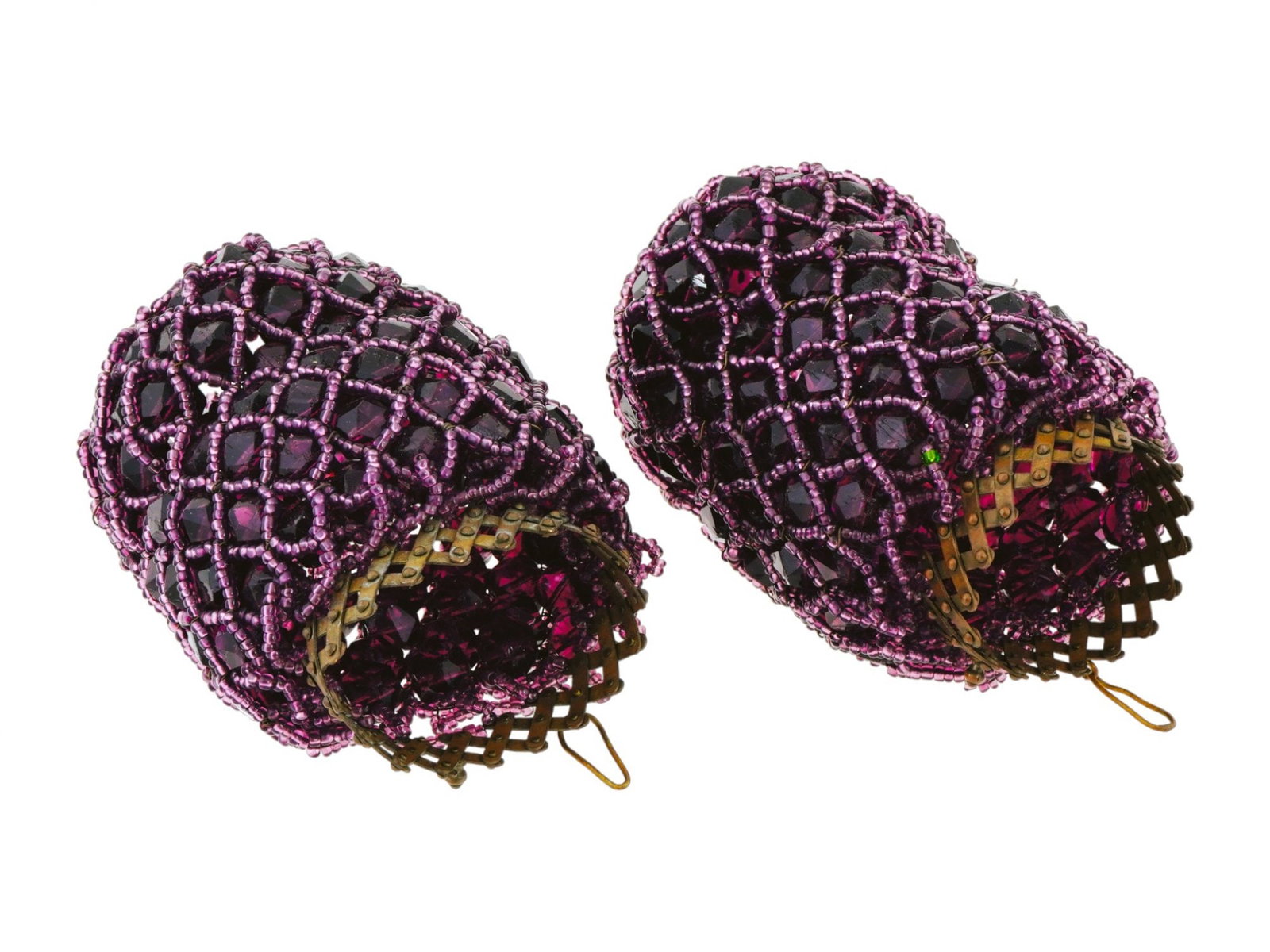 PAIR OF BEADED DESIGN AMETHYST STONE LAMP SHADES: A pair of vintage Art Deco manner lamp shades. The shades are made in a reticulated beaded design and encrusted with Amethyst stones. Unmarked. Circa: the first half of the 20th century. Vintage and M