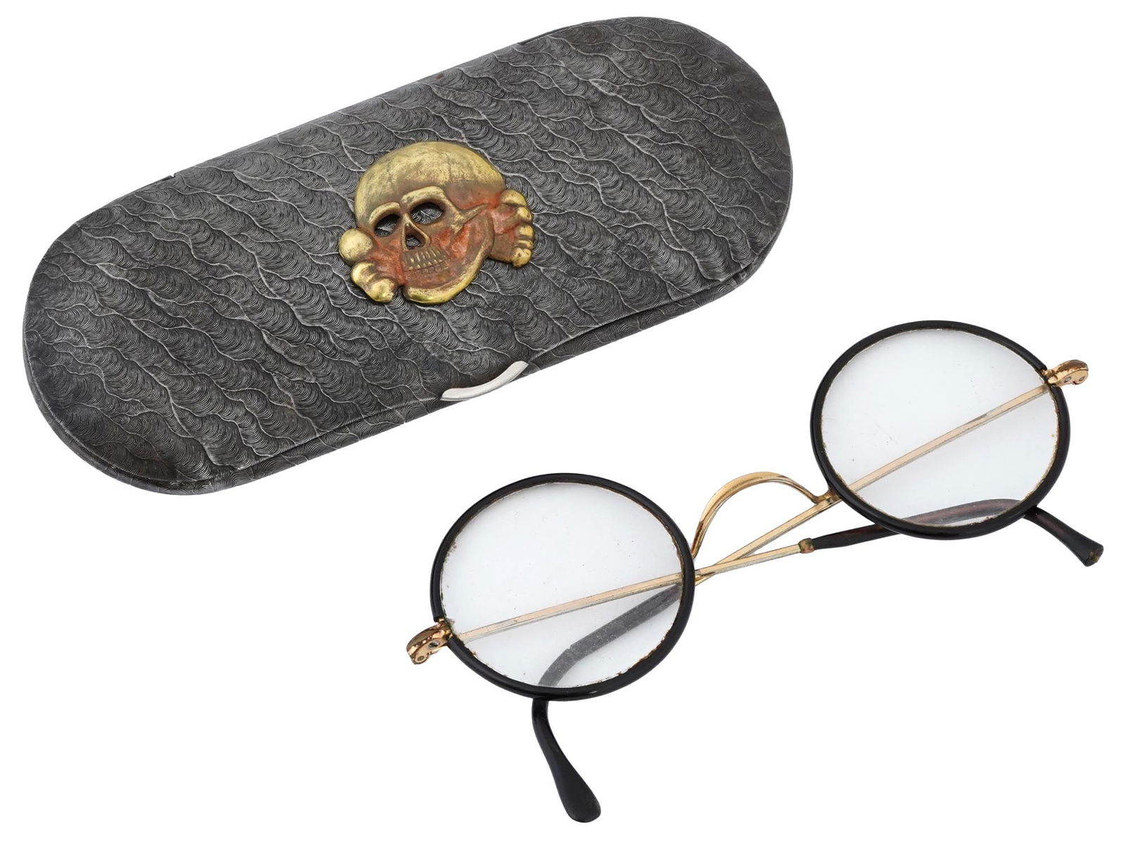 WWII GERMAN WAFFEN SS TOTENKOPF CASE AND GLASSES: World War II Nazi German Third Reich Waffen SS officials eyeglasses. Round shape, gilt metal frame. The glasses come in a metal case, decorated with an engraved abstract pattern, and a gilt overlay To