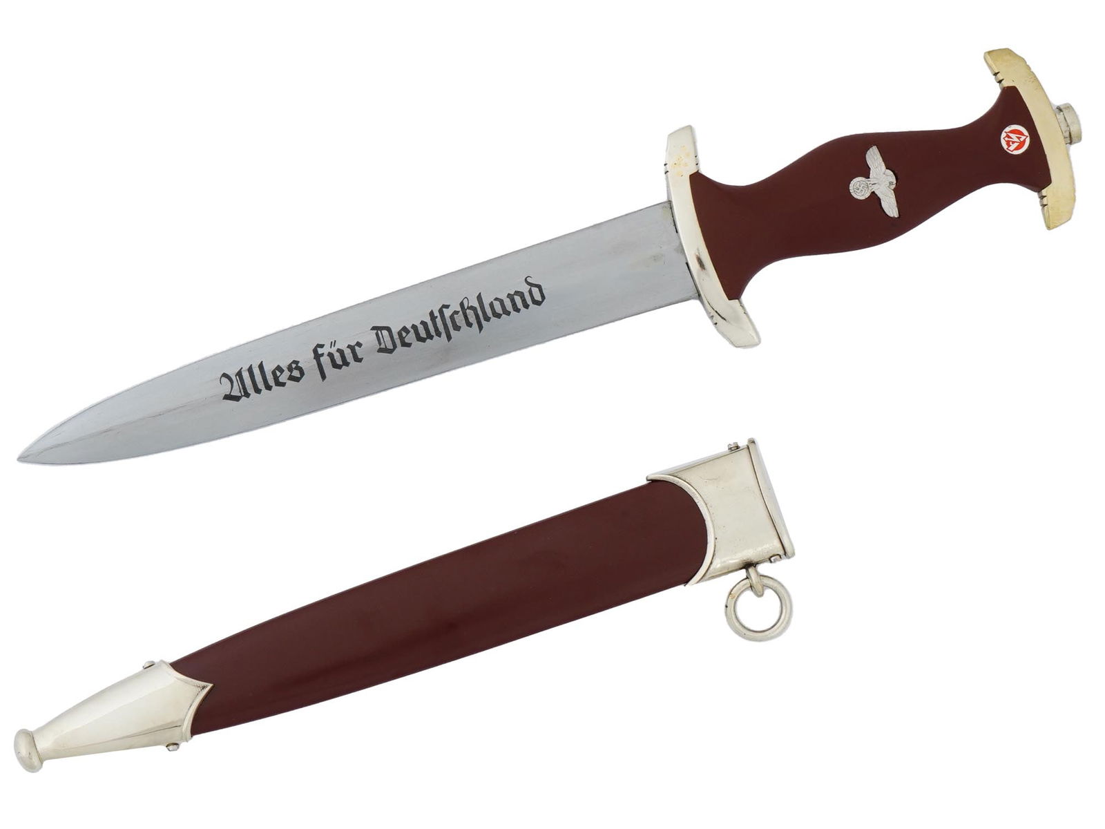 WWII NAZI GERMAN SA DAGGER BY BOKER SOLINGEN: A WWII Nazi German Third Reich SA dagger. The double edged steel blade of the dagger is engraved with the motto in German, Alles Fur Deutschland, Everything for Germany. The dagger features a fruitwoo