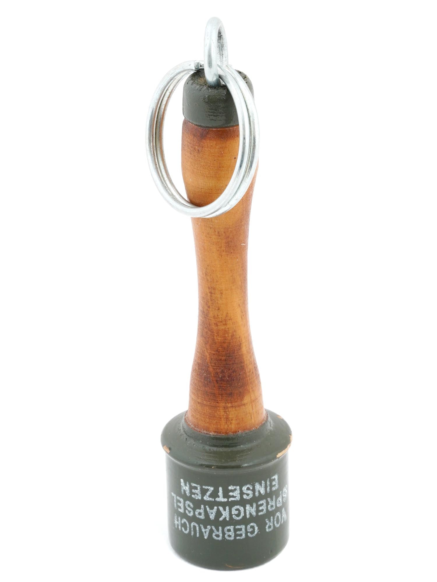 WWII NAZI GERMAN RUSSIAN FRONT M24 STICK HAND GRENADE: A WWII Nazi German Russian front M24 stick hand grenade. Inscribed in german, Vor Gebrauch Sprengkapsel einsetzen, which reminds the Soldier to insert the fuse before use. Stielhandgranate is a German