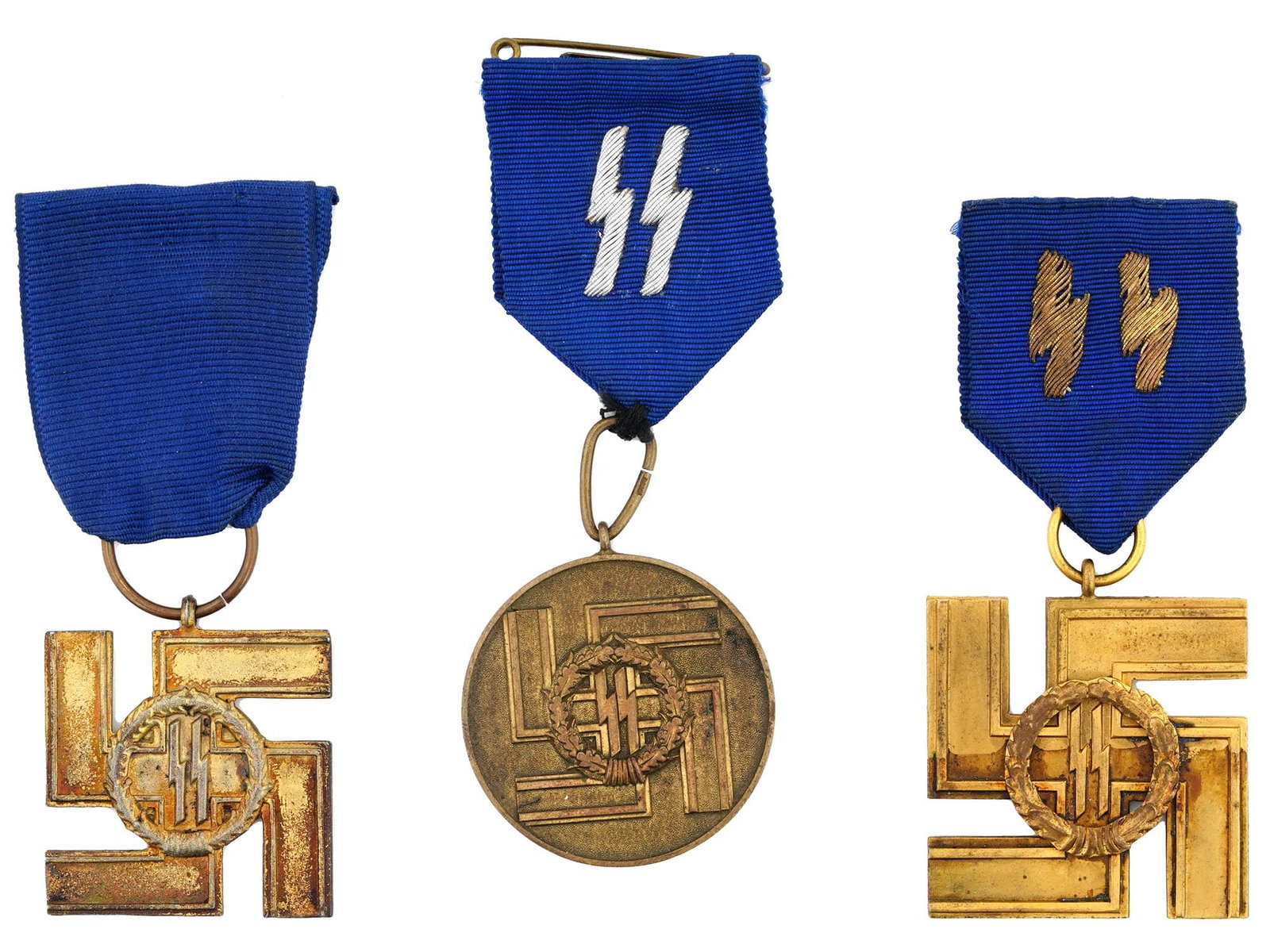 NAZI GERMAN WAFFEN SS LONG SERVICE AWARD MEDALS: A set of three Nazi German Waffen SS Long Service Awards including two medals for 25 year service in the shape of the swastika featuring SS runes in the wreath on the center, with a gold finish, and a