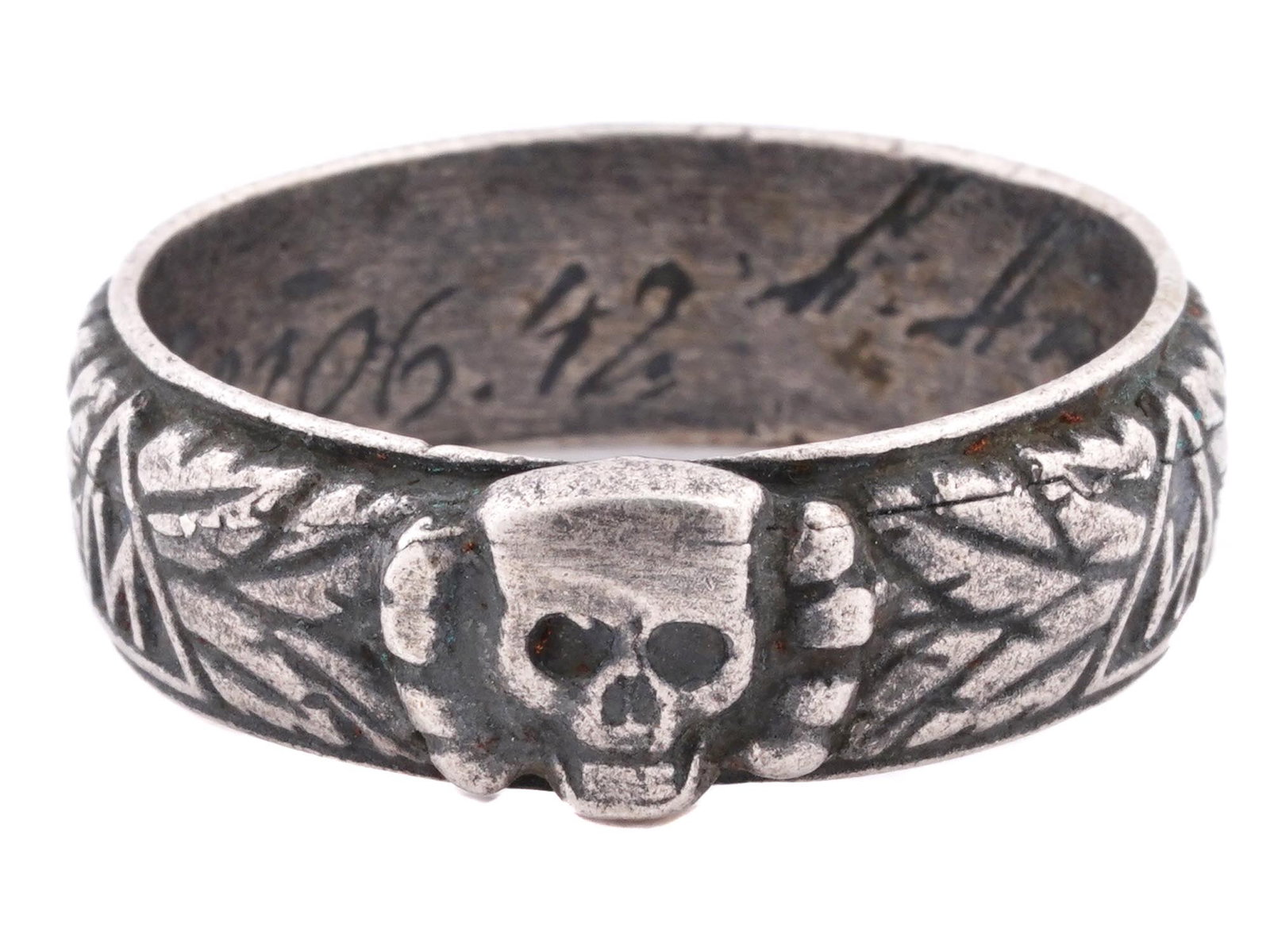 WW2 NAZI GERMAN THIRD REICH SS HIMMLER HONOR RING: A WWII Nazi German Third Reich SS Himmler Honor, probably silver, ring. The exterior of the ring is engraved with oak leaves and swastika insignia patterns, and a Totenkopf swastika insignia in the ce