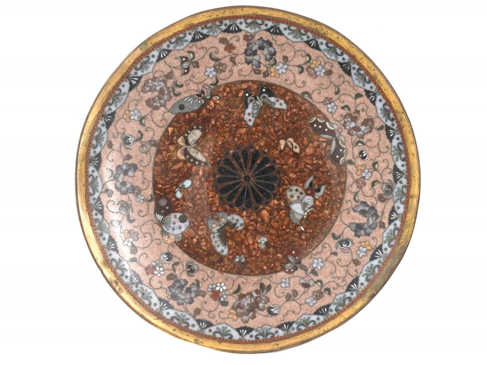 ANTIQUE JAPANESE MEIJI ERA GOLDSTONE ENAMEL PLATE: An antique Meiji period Japanese cloisonne enamel brass plate. The central part depicts an elegant motif with butterflies flying around the central stylized chrysanthemum, a symbol of the Japanese Emp