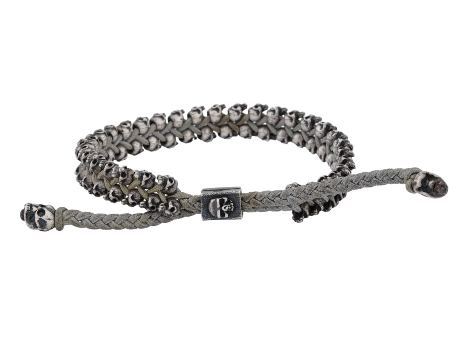 VINTAGE M. COHEN SILVER ACCENT CUFF BRACELET KNOTTED: A vintage M. Cohen silver accent cuff bracelet knotted by hand using grey cords, offering a unique blend of craftsmanship and contemporary design. M. Cohen pieces often integrate handcrafted elements