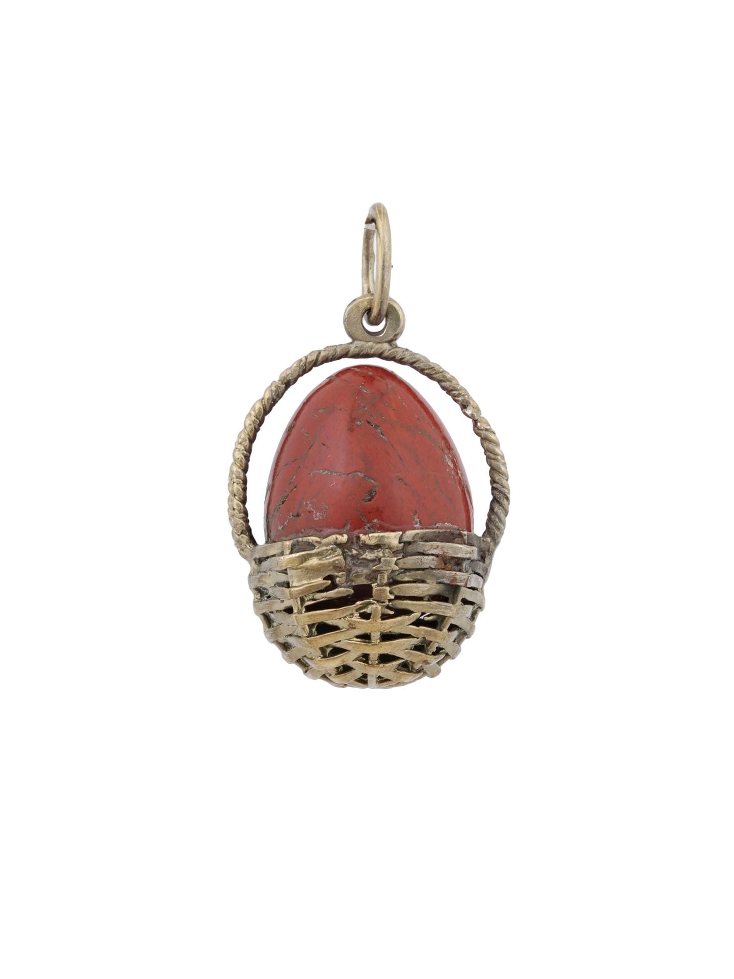 RUSSIAN GILT SILVER RED JASPER BASKET EGG PENDANT: A Russian gilt silver and red jasper pendant shaped as an egg in a basket. Marked with an 88 Russian Imperial silver standard and the Cyrillic makers initials on a fitting ring. Fine Russian Silver Je