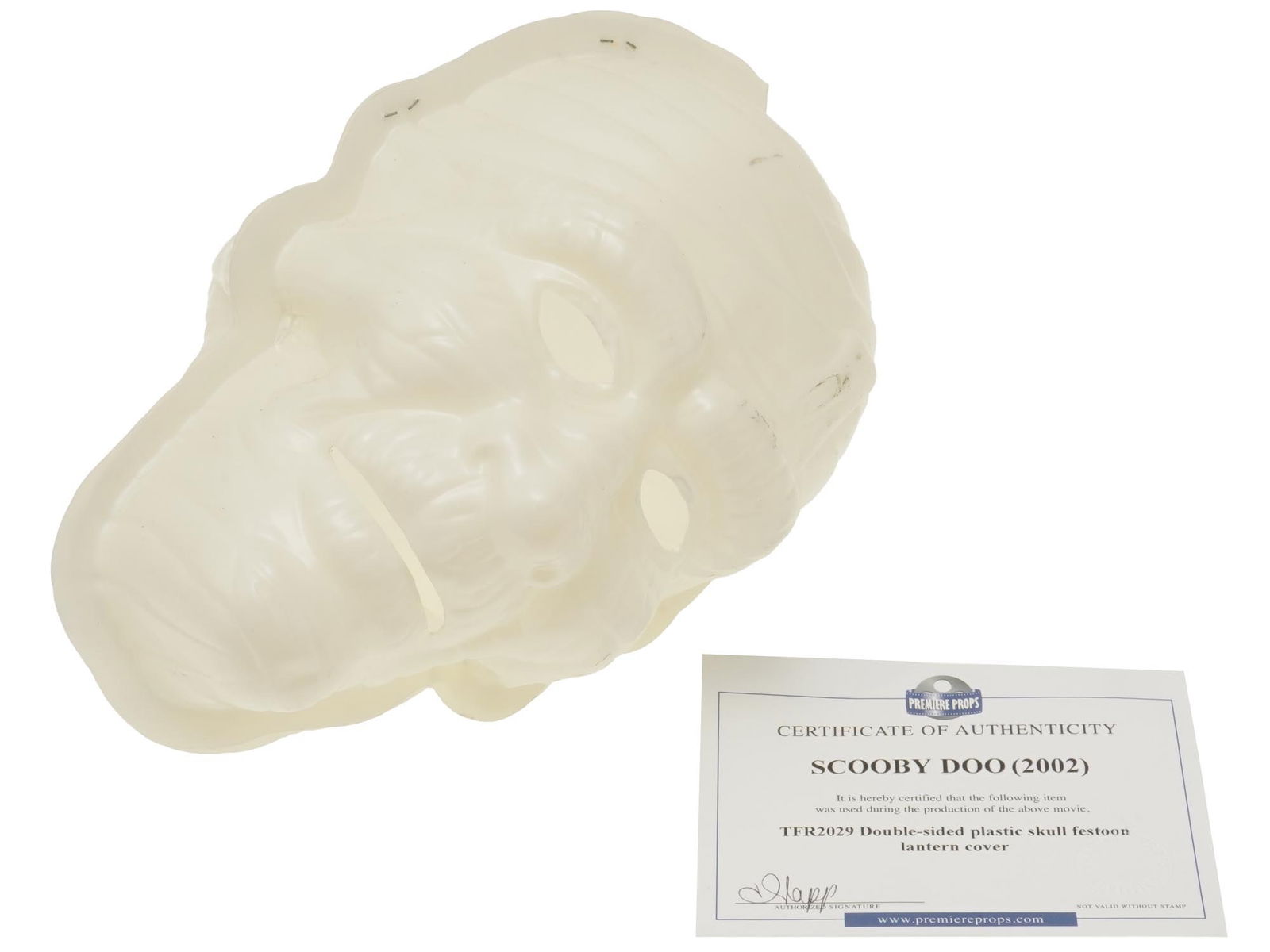 SCOOBY DOO PLASTIC SKULL FESTOON LANTERN COVER: An original Scooby Doo white double sided plastic skull festoon lantern cover. Comes from the Debbie Reynolds archive collection which was formed by Debbie Reynold and her son Todd Fischer who collect