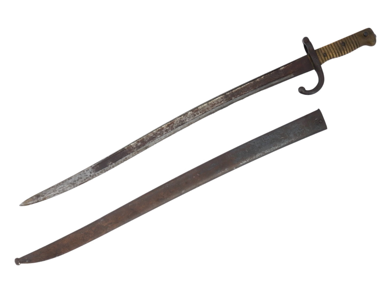 1867 FRENCH CHASSEPOT SWORD BAYONET IN SCABBARD: An antique late 19th-century French sword bayonet for .on the 11 mm. M1866 Chassepot needle-fire rifle or M1874 Gras rifle. Dated ca. 1867. Slightly curved blade, ribbed grip, crossguard marked M 2626