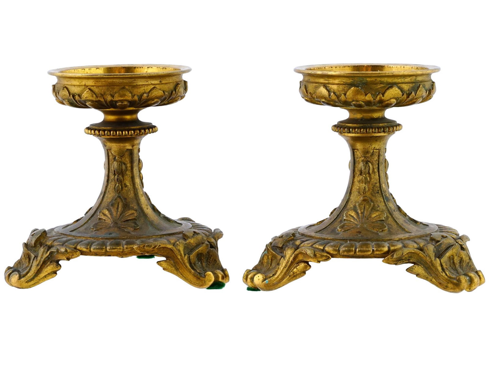 PAIR OF ANTIQUE GILT BRONZE FOOTED PEDESTAL BASES: A pair of antique gilt bronze footed pedestal bases designed specifically for fruit bowls. These timeless pieces exude sophistication and craftsmanship, embodying an era of refined aesthetics. Crafted