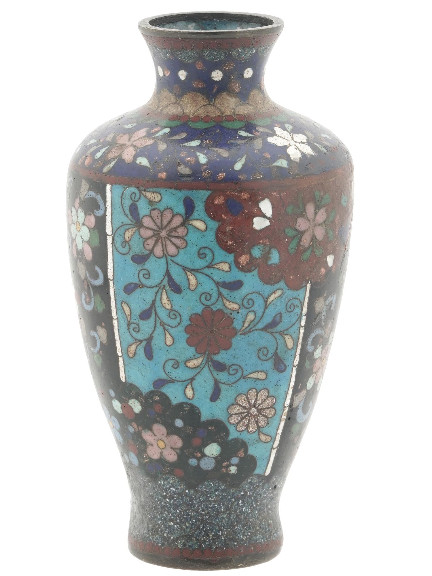 ANTIQUE JAPANESE GOLD STONE CLOISONNE ENAMEL VASE: An antique Japanese Meiji era decorative brass vase. The vase has a baluster shaped body and a short and wide neck. The exterior is adorned with polychrome floral, foliage and wavy patterns made in th