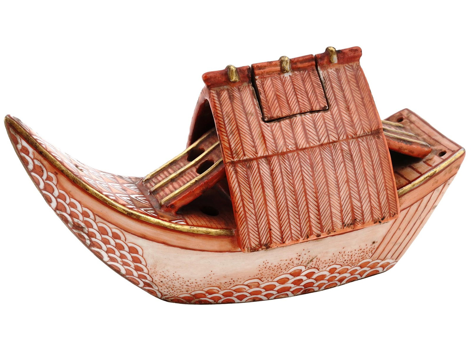 ANTIQUE JAPANESE JUNK BOAT SHAPED INCENSE BURNER: An antique Japanese incense burner in the shape of a junk boat. Crafted with meticulous attention to detail, this incense burner showcases the unique blend of form and function that characterizes trad