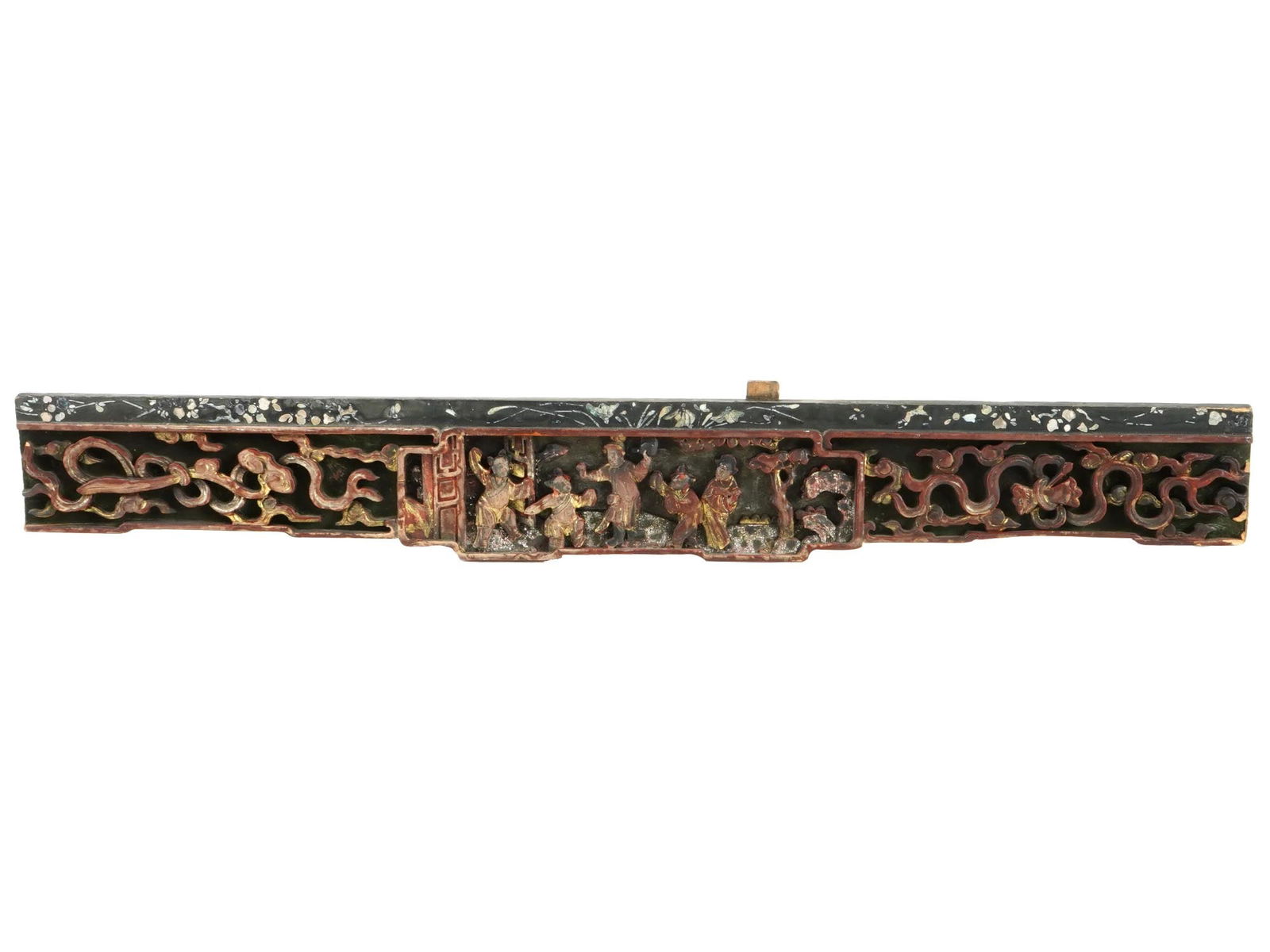 ANTIQUE CHINESE QING CARVED WOODEN PANEL WITH MOP INLAY: An antique Chinese decorative wooden wall panel. Late Qing era, before 1912. Frieze plaque with hand-carved bas-relief figurative genre scene and branch ornament. Gilt accents. The top rim is painted