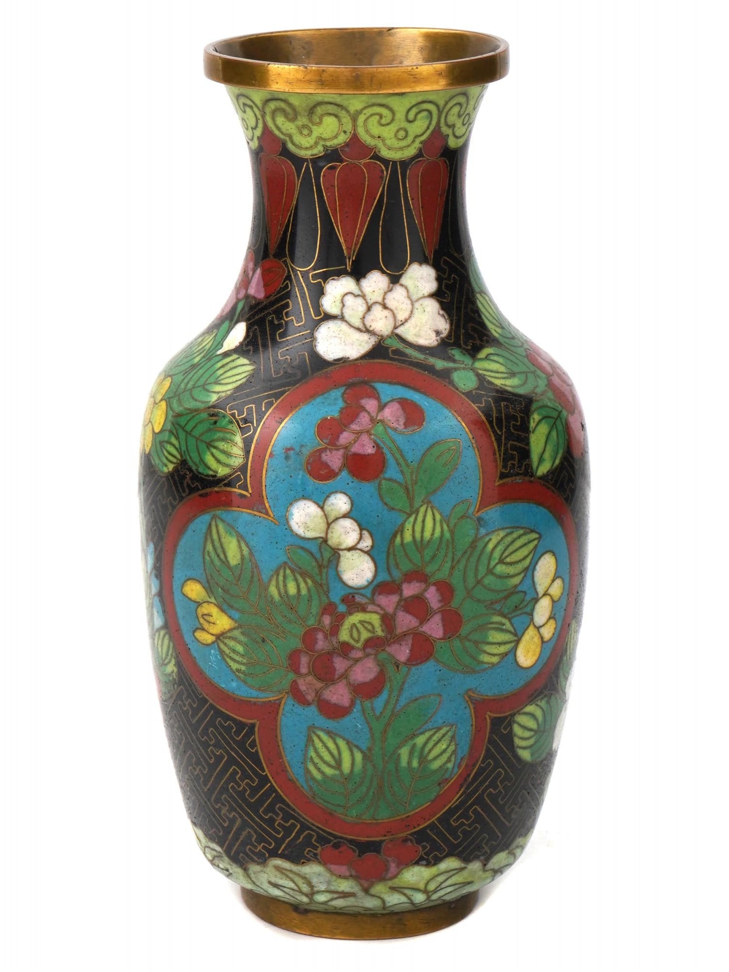 ANTIQUE CHINESE CLOISONNE ENAMEL OVER BRASS VASE: An antique Chinese enamel over brass vase. The vase has an urn shaped body, a wide neck, and a fluted mouth. The vase is adorned with polychrome enamel medallions depicting blossoming flowers surround