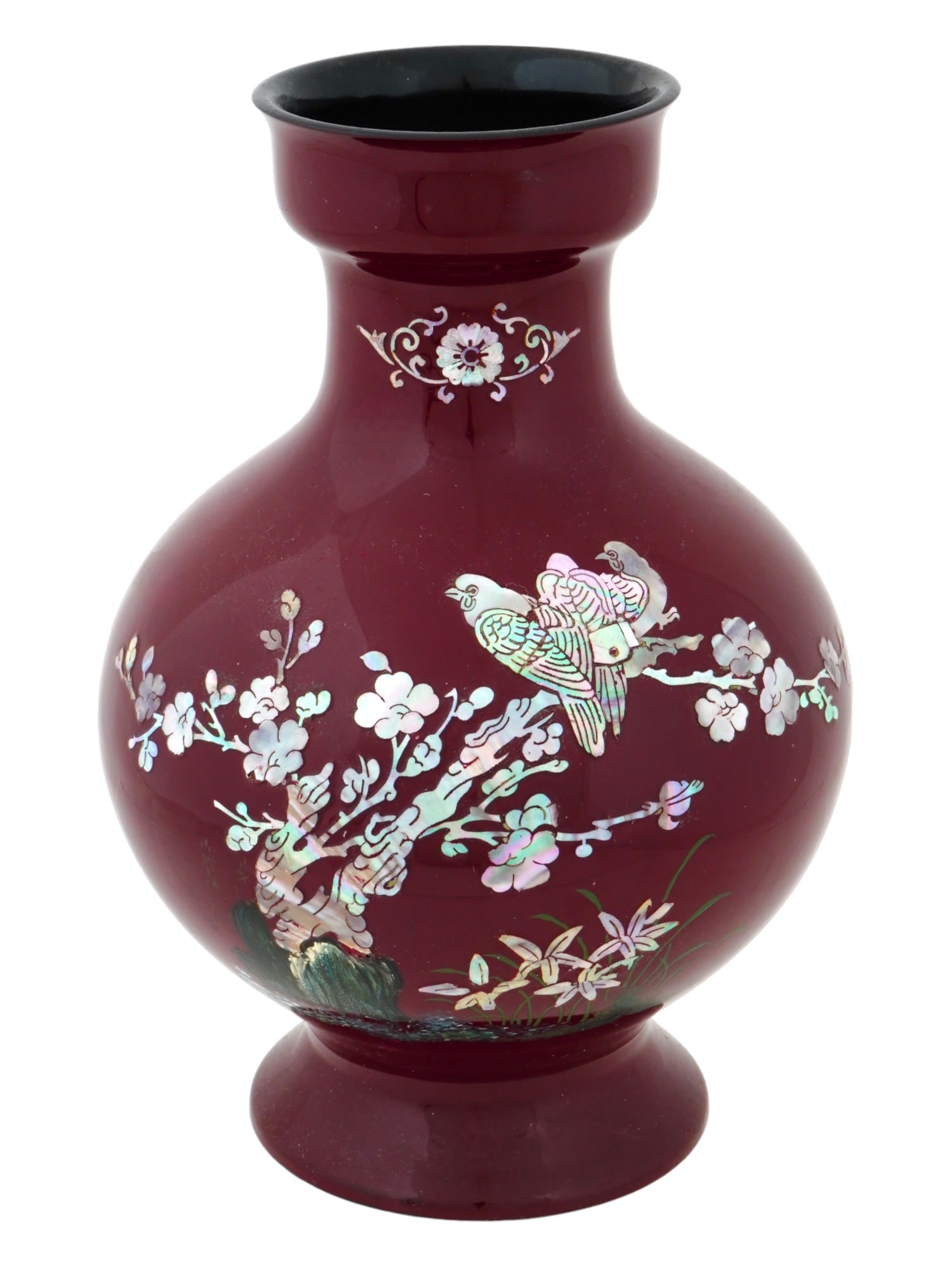KOREAN LACQUERED VASE WITH MOTHER OF PEARL INLAY: A 1970s Korean lacquered wood vase of burgundy red color. Bulbous shape with pronounced base and neck. The body is decorated with mother-of-pearl inlay representing cherry blossoms and birds. Label st
