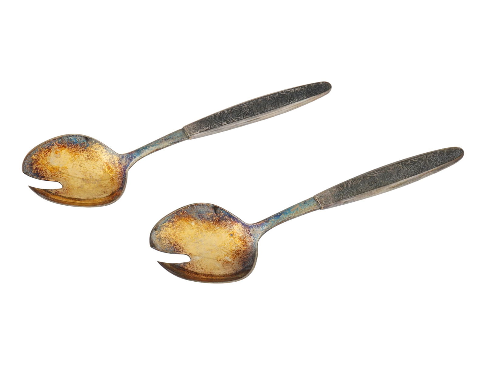 SOVIET ERA TALLINN FACTORY SILVER SALAD SPOONS 1972: A pair of vintage Estonian Soviet era silver salad serving spoons made by the Tallinn Jewelry Factory circa 1972. Relief decor to the handles. Hallmarked 2TJ 916. Soviet Era Silverware, Serveware And
