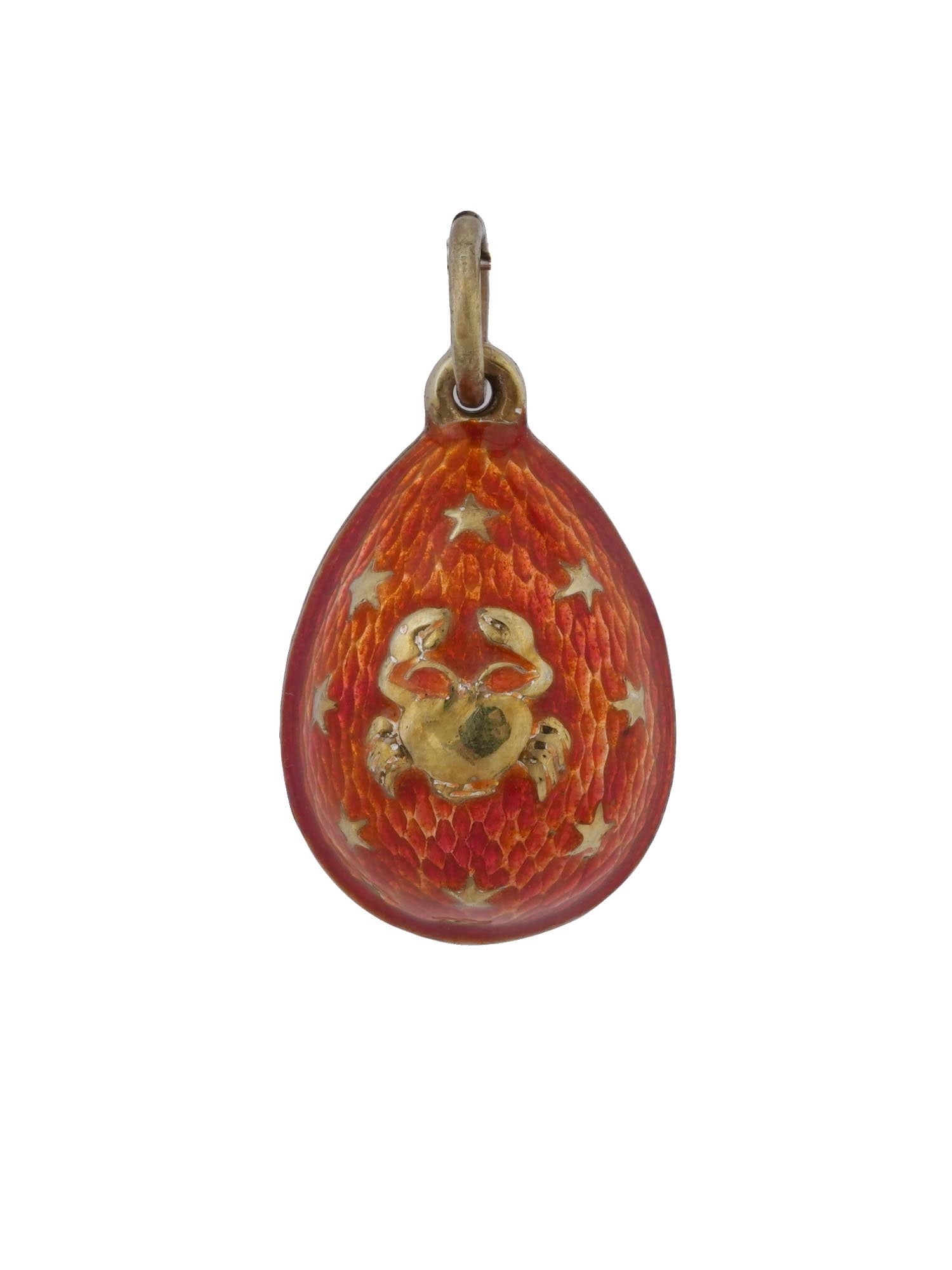 RUSSIAN GILT SILVER ENAMEL CANCER EGG PENDANT: A Russian gilt silver Easter egg pendant decorated with a shimmering scarlet guilloche enamel throughout. Features a relief image of a Cancer, an astrological sign, to the front side, with raised star
