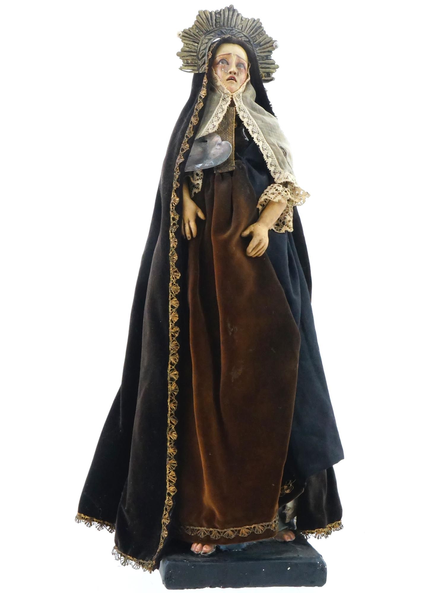 ANTIQUE 18TH C SPANISH COLONIAL BAROQUE SANTOS FIGURE: A rare and highly collectible antique Baroque figure of a weeping saint. The figure is beautifully hand painted and dressed in a dark long robe with a complex headdress, symbolizing the radiance of a 