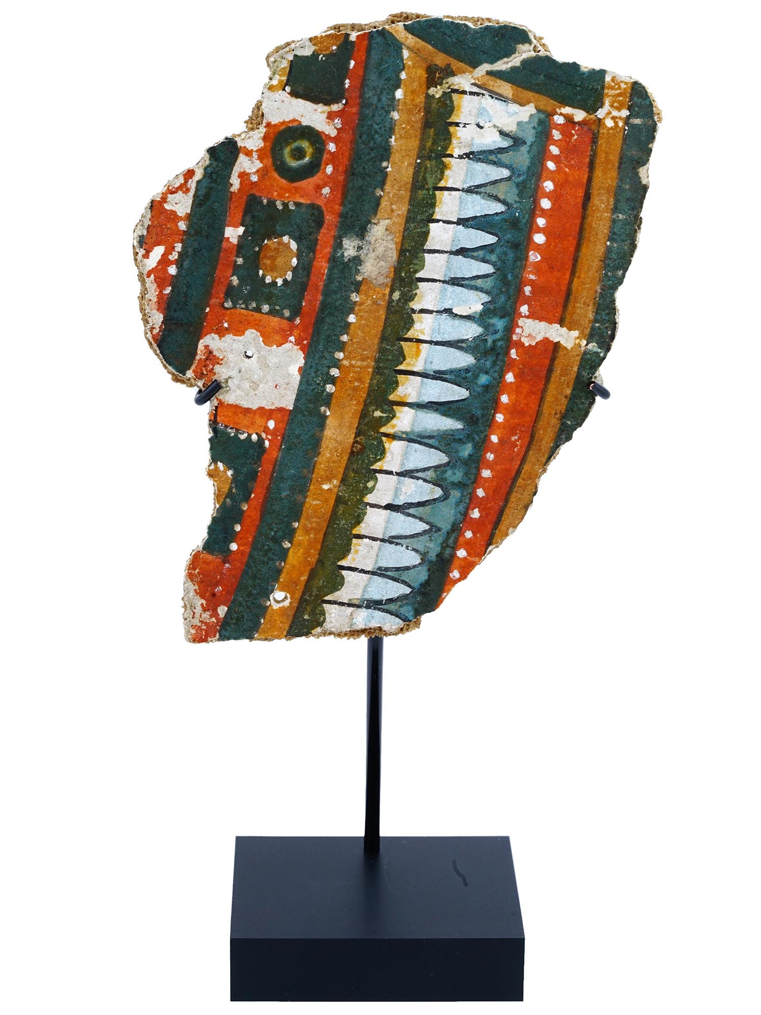 ANCIENT EGYPTIAN CARTONAGE FRAGMENT COLLAR OF A MUMMY: An ancient Egyptian polychrome cartonnage fragment from a collar of a mummy. The fragment is decorated with traditional ornaments. Marked with a paper label, Case 120, on the backside. Mounted on a re