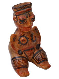 ANCIENT PRE COLUMBIAN COSTA RICAN WHISTLE FIGURE: An ancient Pre Columbian Costa Rican seated female whistle figure from Nicoya. The handcrafted clay figurine is painted red and black. On the back of the figure, there are several elongated holes of d