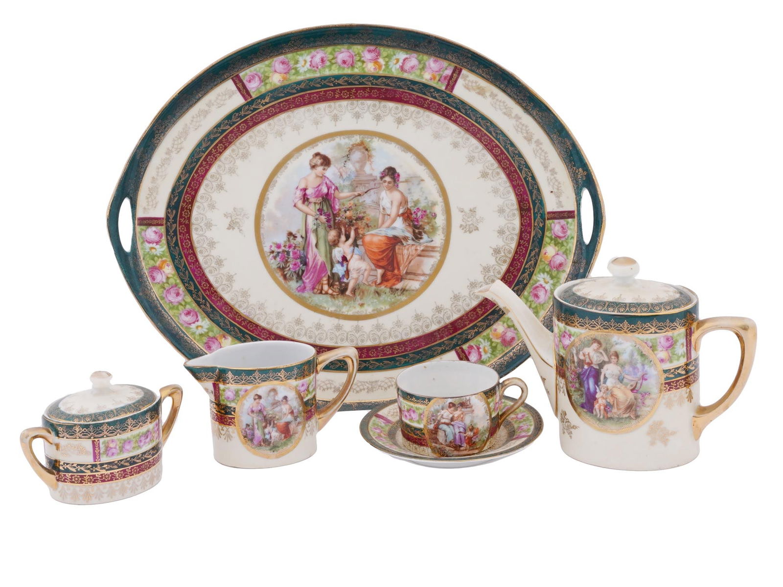 ANTIQUE DUTCH PORCELAIN HAND DECORATED TEA SET: An antique Dutch porcelain tea set consisting of a tea cup, a teapot, a lidded sugar bowl, a creamer, and a tray. All decorated in the same style featuring images of two ladies in the garden with a cu