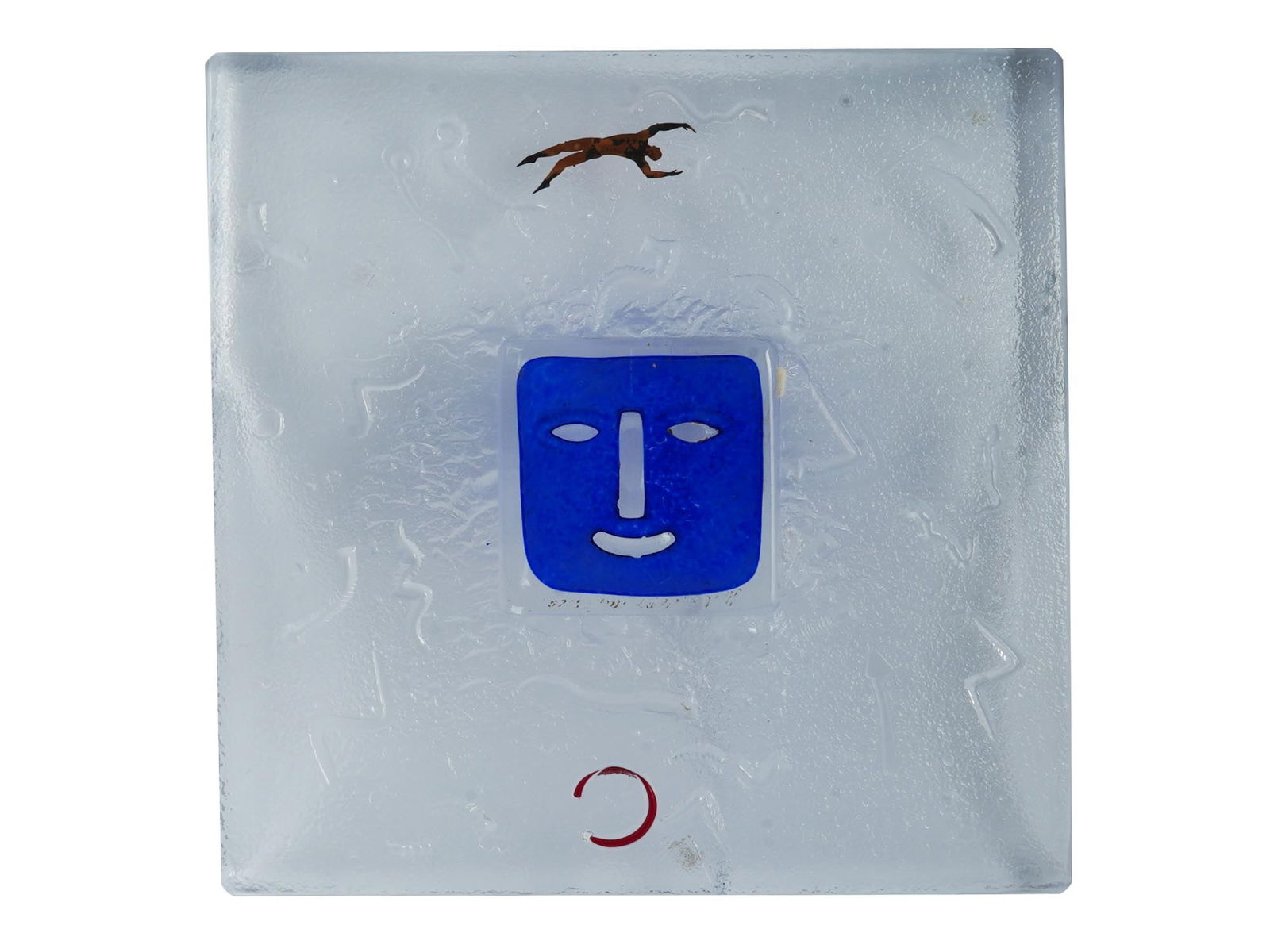 BERTIL VALLIEN KOSTA BODA DOMINO SERIES GLASS DISH: A glass dish from the Domino series designed by Bertil Vallien, born 1938, a Swedish glass artist, for Kosta Boda. Square in shape with slightly upturned corners, this dish has a blue square face desi