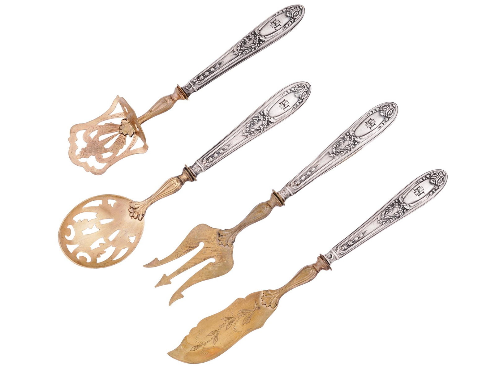 WWII SILVER FISH CARVING SET OF HEINRICH HIMMLER: A World War II fish cutlery set with sterling silver handles. A total of 4 items, a knife, a fork, a spoon and a spatula with a guard. Gilt pierced main parts with etched decor. The handles have flora