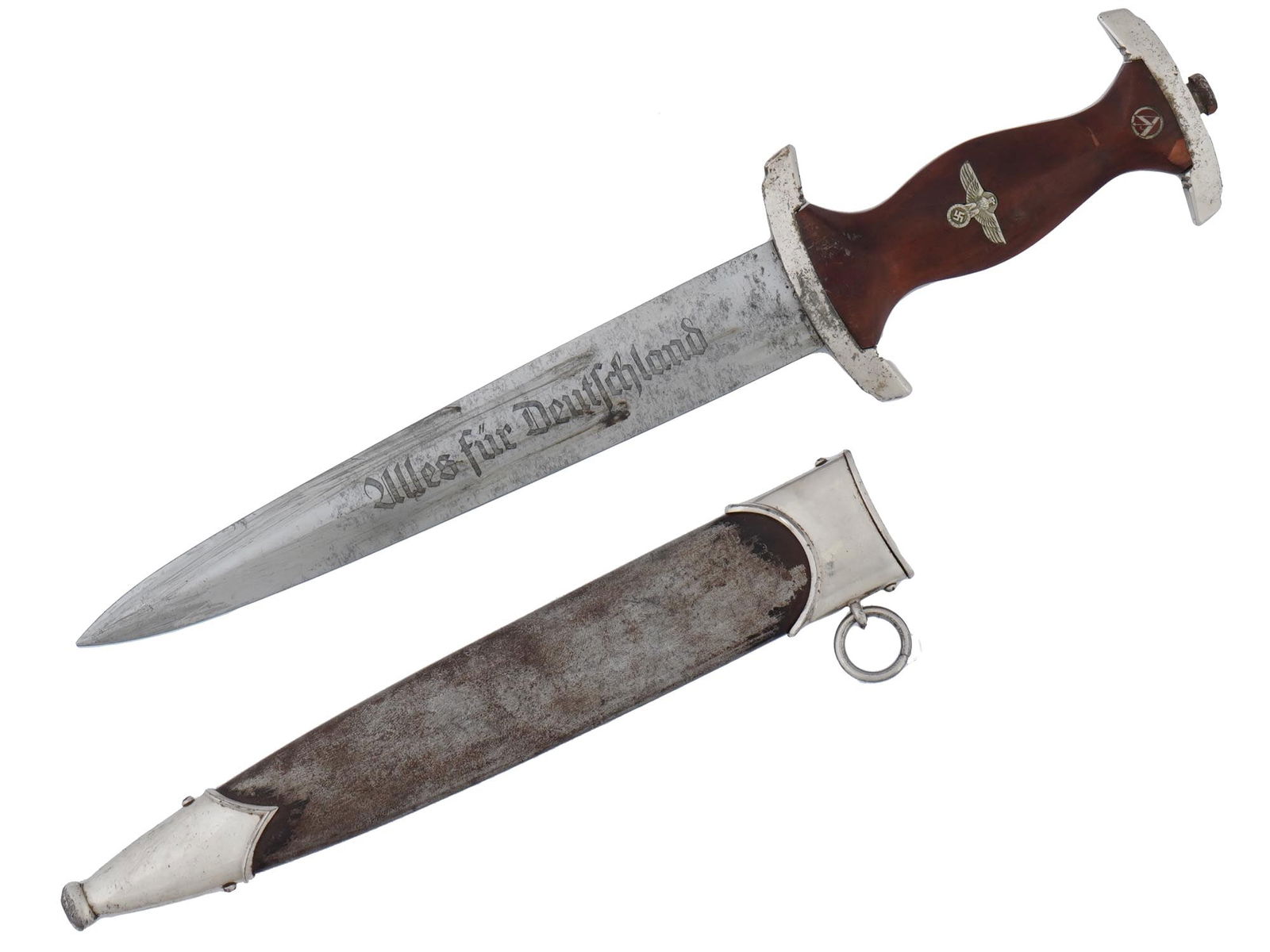 WWII NAZI GERMAN SA DAGGER BY RZM W SCABBARD: A WWII Nazi German Third Reich SA dagger. The double edged steel blade of the dagger is engraved with the motto in German, Alles Fur Deutschland, Everything for Germany. The dagger features a fruitwoo