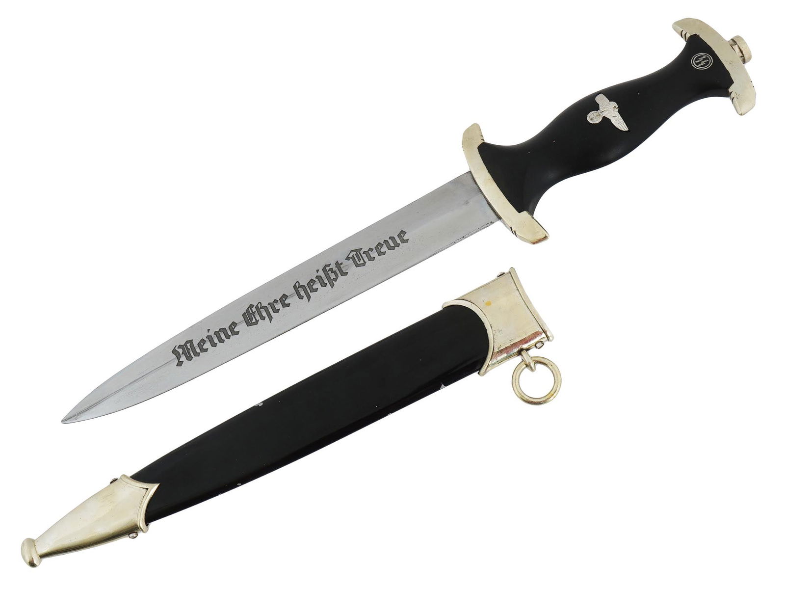 GERMAN WWII SS DAGGER BY BOKER SOLINGEN: A WWII Nazi German Third Reich Waffen SS dagger. The dagger features a silver plated nickel blade with the engraved motto in German which reads My Honor Is Loyalty. The obverse of a wooden handle bear