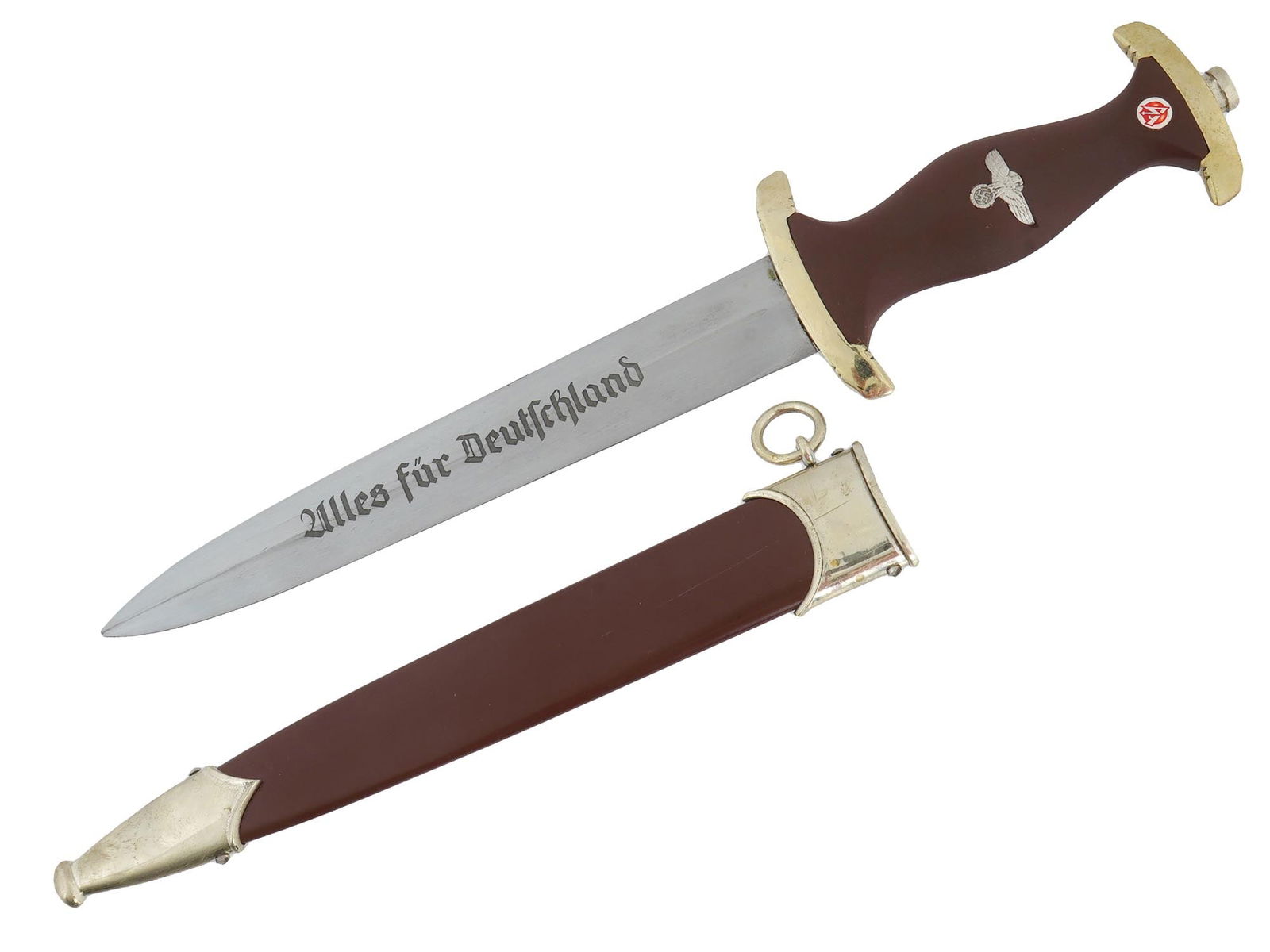 NAZI GERMAN WWII SA DAGGER BY BOKER SOLINGEN: A WWII Nazi German Third Reich SA dagger. The double edged steel blade of the dagger is engraved with the motto in German, Alles Fur Deutschland, Everything for Germany. The dagger features a fruitwoo