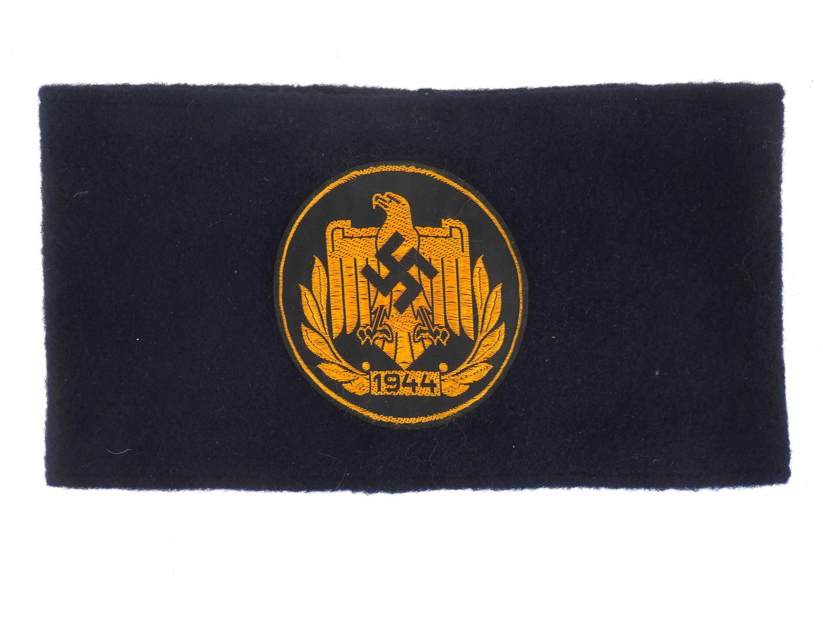 GERMAN WWII NSRL DRL ARM BAND: A WWII Nazi German Third Reich NSRL DRL sports officials arm band. The front shows an embroidered patch with a Nazi eagle with a swastika insignia in the center in black and yellow shades. Machine emb