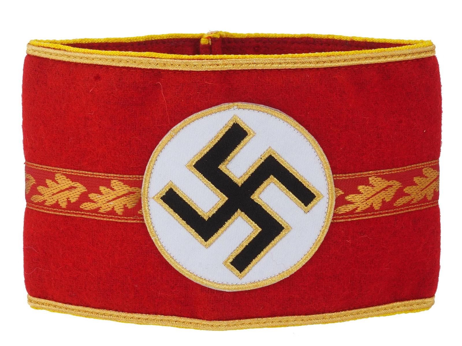 GERMAN 3RD REICH ARMBAND OF NSDAP POLITICAL LEADER: A German 3rd Reich armband of a very high ranking NSDAP political leader. Made of red felt with golden thread embroidery, features a Swastika emblem and an oak leaves pattern. Second World War Histori