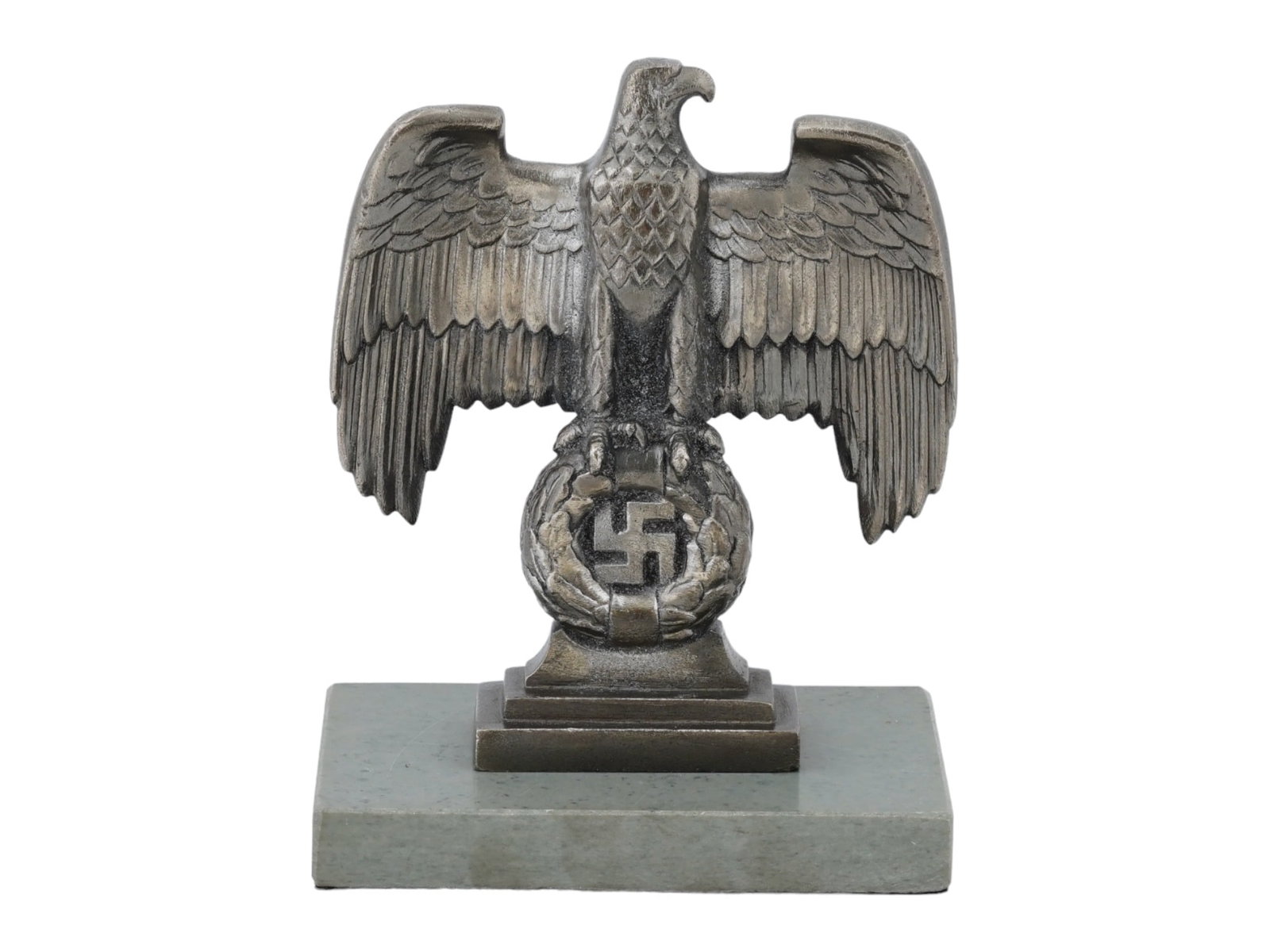 GERMAN WWII NUREMBERG DESK EAGLE FIGURINE: A vintage silver tone metal figurine, a miniature copy of the bronze Nuremberg eagles positioned to each side of the main podium at the Nuremberg rally grounds, the architectural symbol of the Third R