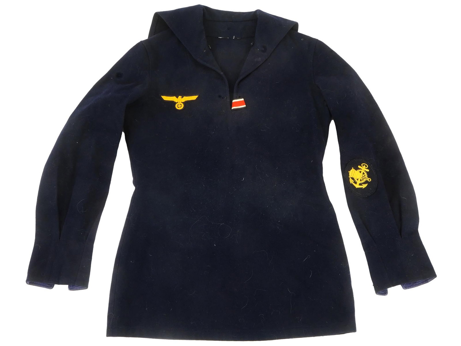 WWII NAZI GERMAN KRIEGSMARINE U-BOAT SAILORS SHIRT: A WWII Nazi German Kriegsmarine U-Boat sailors shirt. Dark blue wool construction with a Kriegsmarine eagle emblem sewn on the front. Second World War Historical Collectibles And Memorabilia, Military