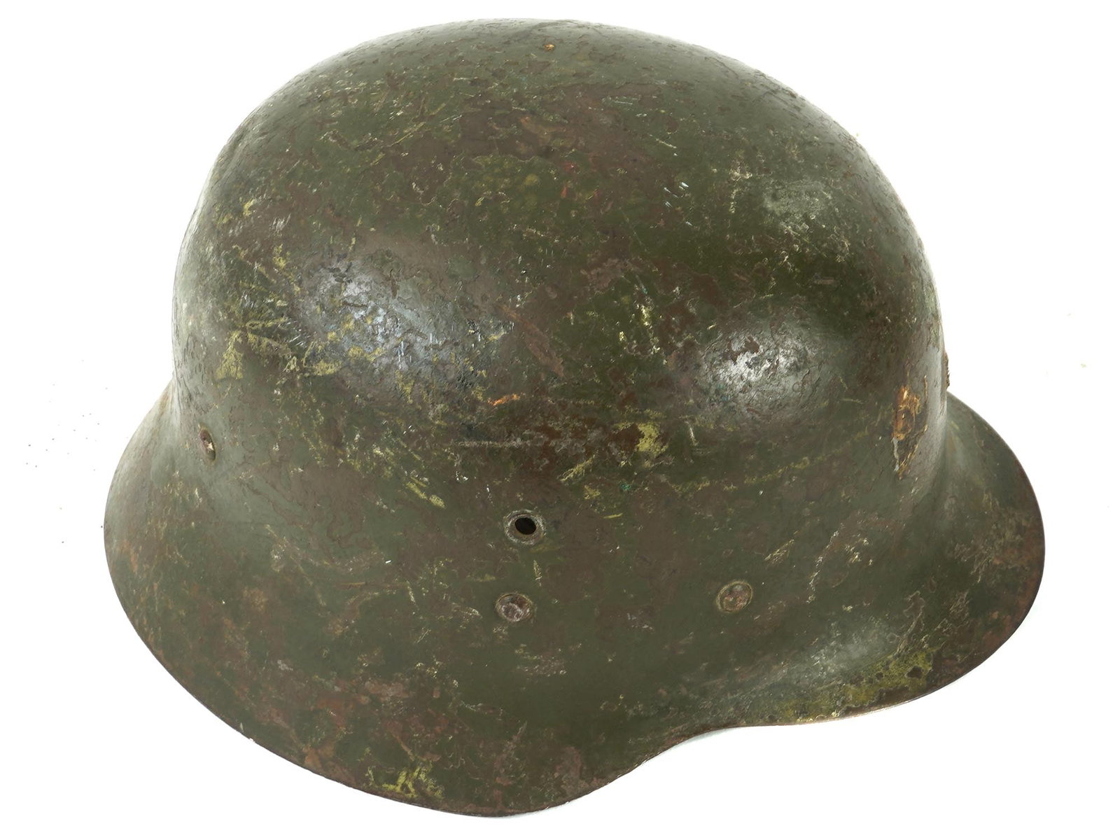POST WWII SPANISH MILITARY STEEL HELMET: A mid-20th century Spanish military helmet. After 1945. A steel helmet intended to provide protection against shrapnel and fragments of grenades. Distinctive coal scuttle shape, matte khaki color. Lea