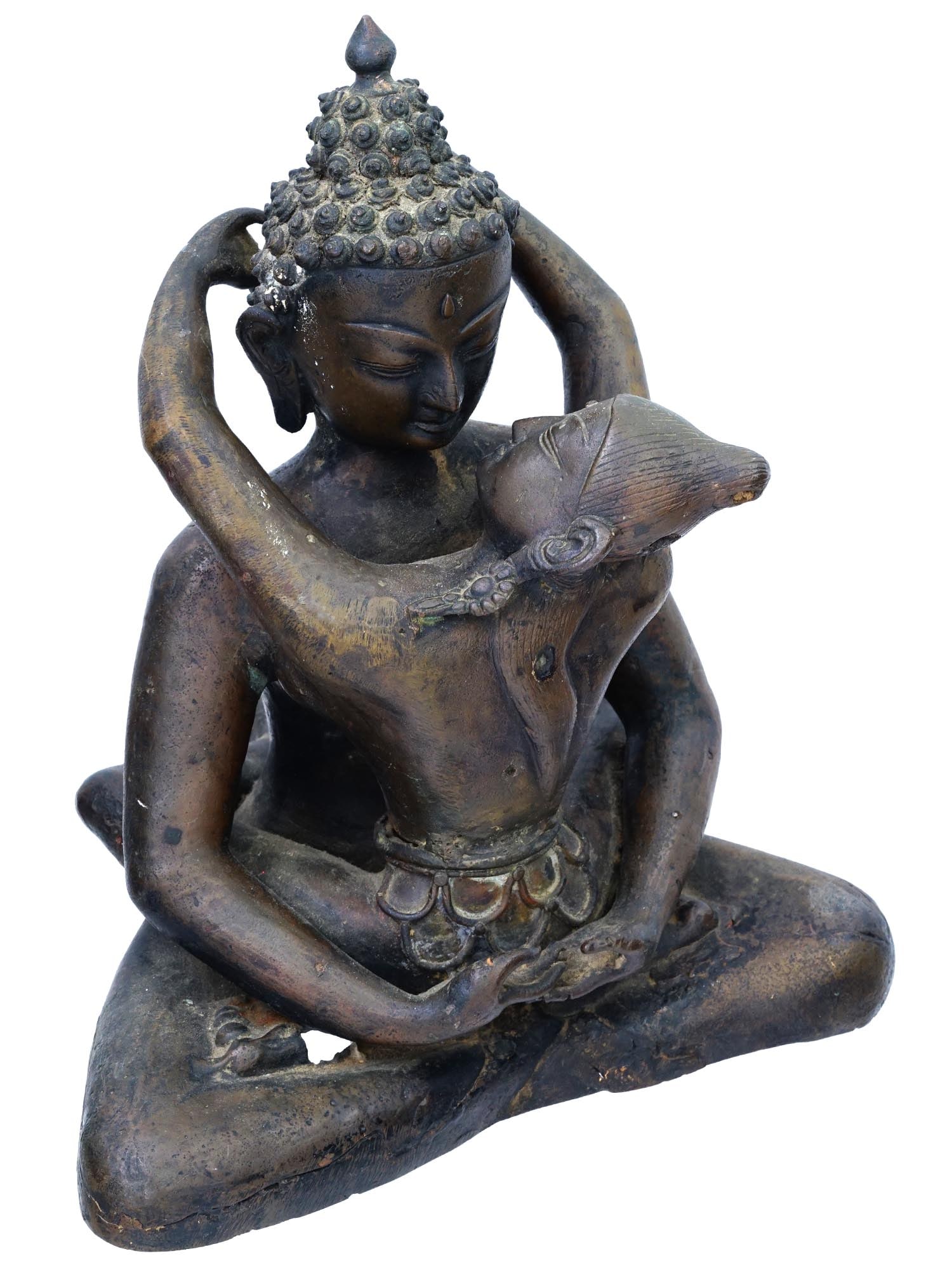 TIBETAN BUDDHIST EROTIC YAB YUM BRONZE SCULPTURE: A vintage Tibetan cast bronze sculpture representing Buddha with his female consort on his lap. This iconography is known as Yab Yum, a Tantric concept which represents compassion and insight. Collect