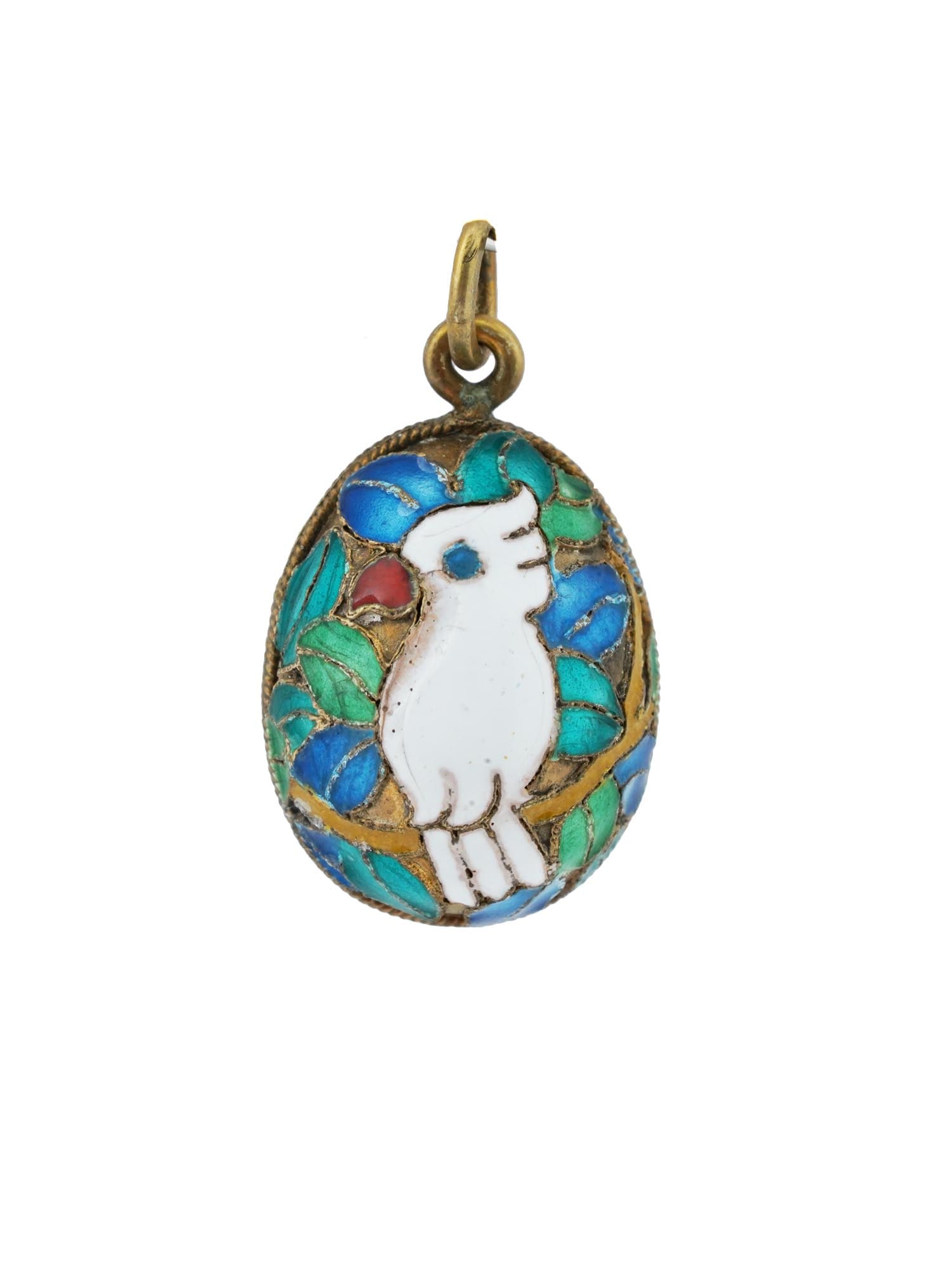 RUSSIAN GILT SILVER ENAMEL PARROT EASTER EGG PENDANT: A Russian gilt silver Easter egg pendant. Consisting of two halves, each adorned with a multicolor cloisonne enamel work featuring a white parrot perched on a branch. The depiction of the parrot, a sy
