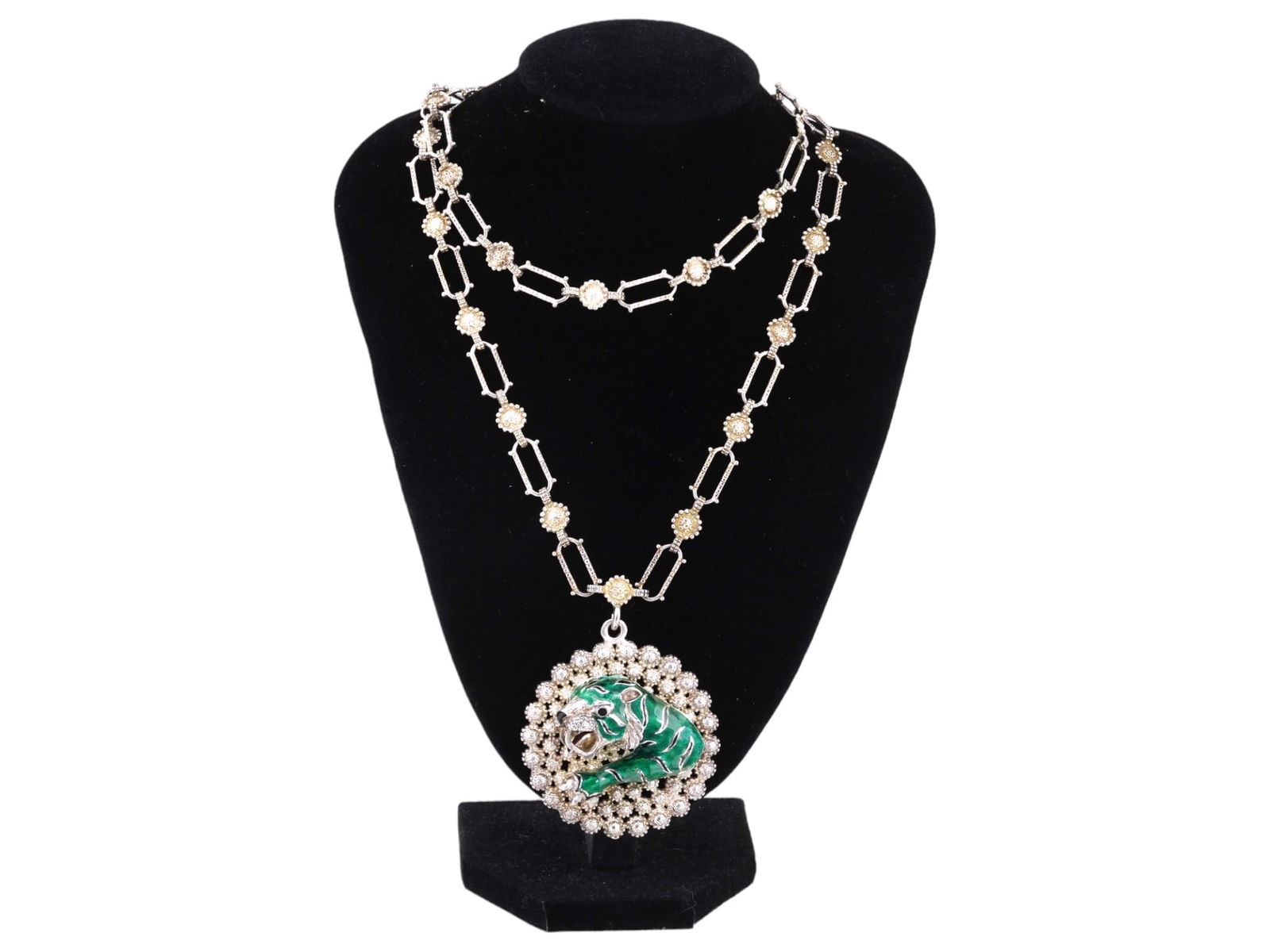 GUCCI STERLING SILVER ENAMEL TIGER LINK NECKLACE: A vintage sterling silver link necklace by Gucci. Studded design. Large round pendant with green and black enameled relief tiger. Marked Italy 925 on the backside. Total Weight: 104 grams. Provenance: