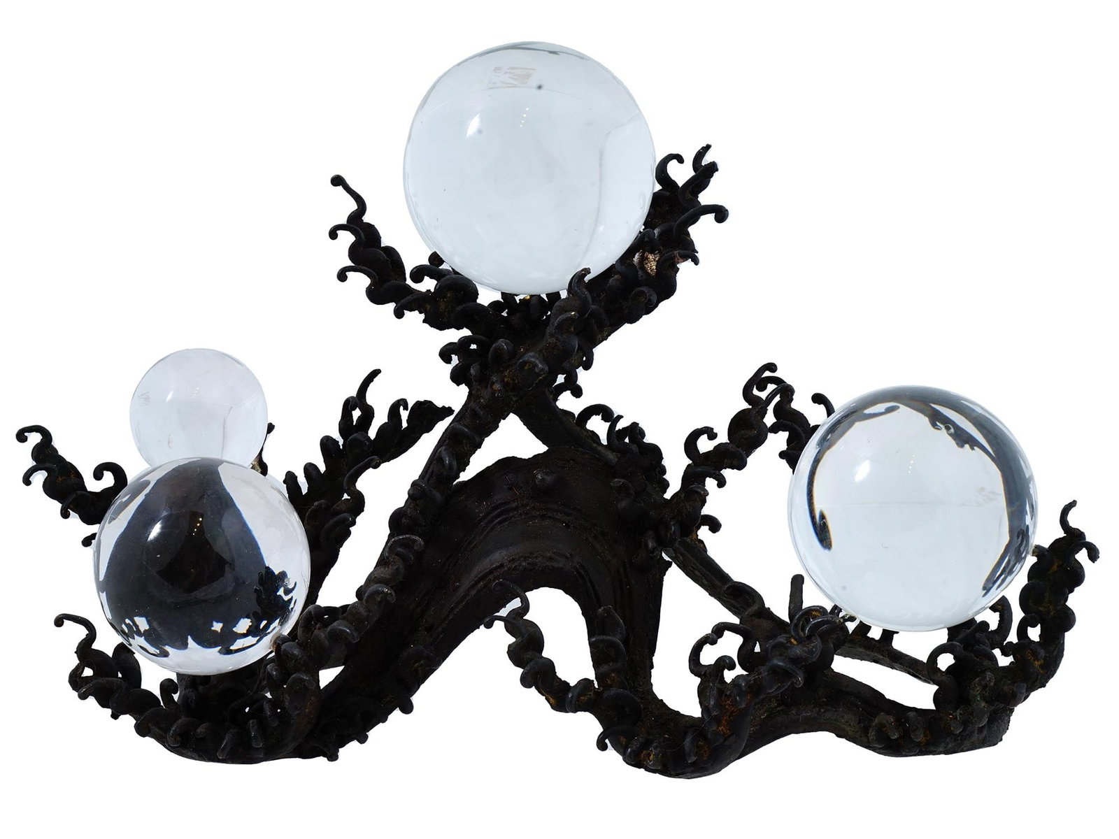 JAPANESE MEIJI BRONZE AND ROCK CRYSTAL SPHERES: An antique Japanese interior decoration. Meiji period, 1868 to 1912. Bronze wave sculpture with finely cast crashing wave details completed with four carved rock crystal spheres of various size. The s