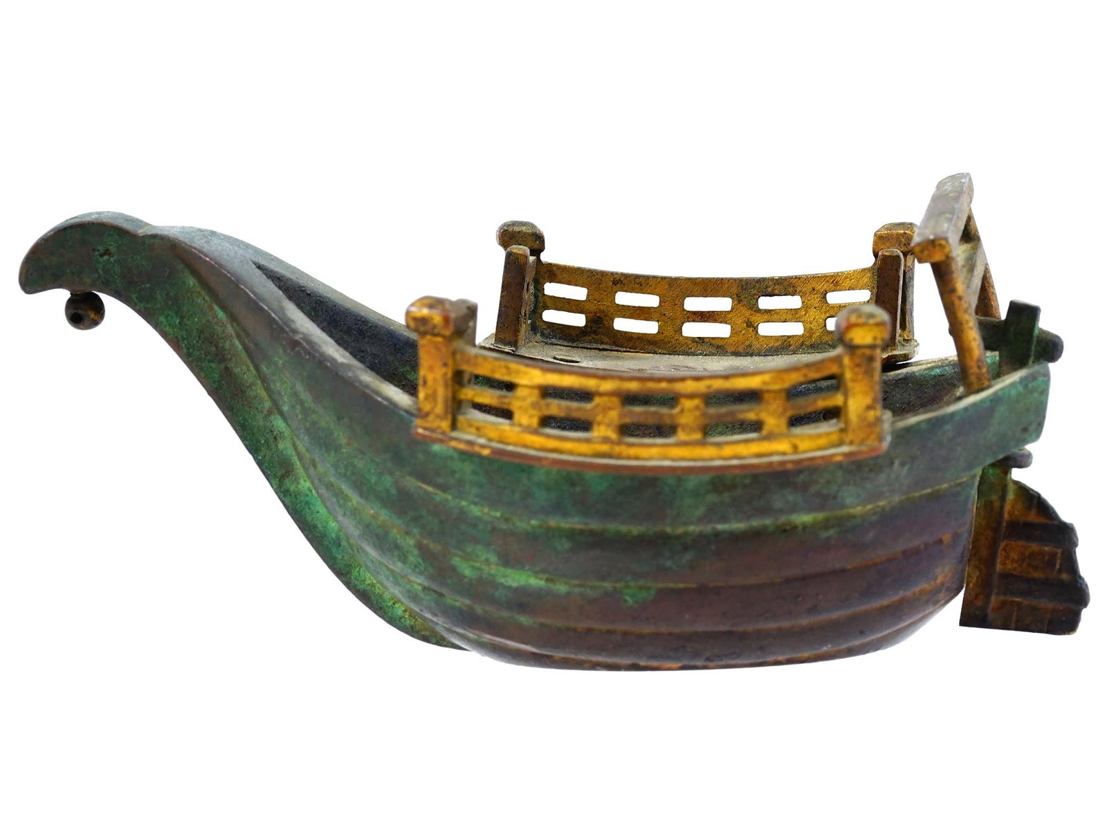 JAPANESE TAISHO BRONZE TAKARABUNE BOAT MARKED: A Japanese cast bronze model of a boat. Taisho era, 1912 to 1949. Green patina, gilt deck details. The piece represents a Takarabune, the mythical Treasure Ship of Japanese folklore which is piloted t