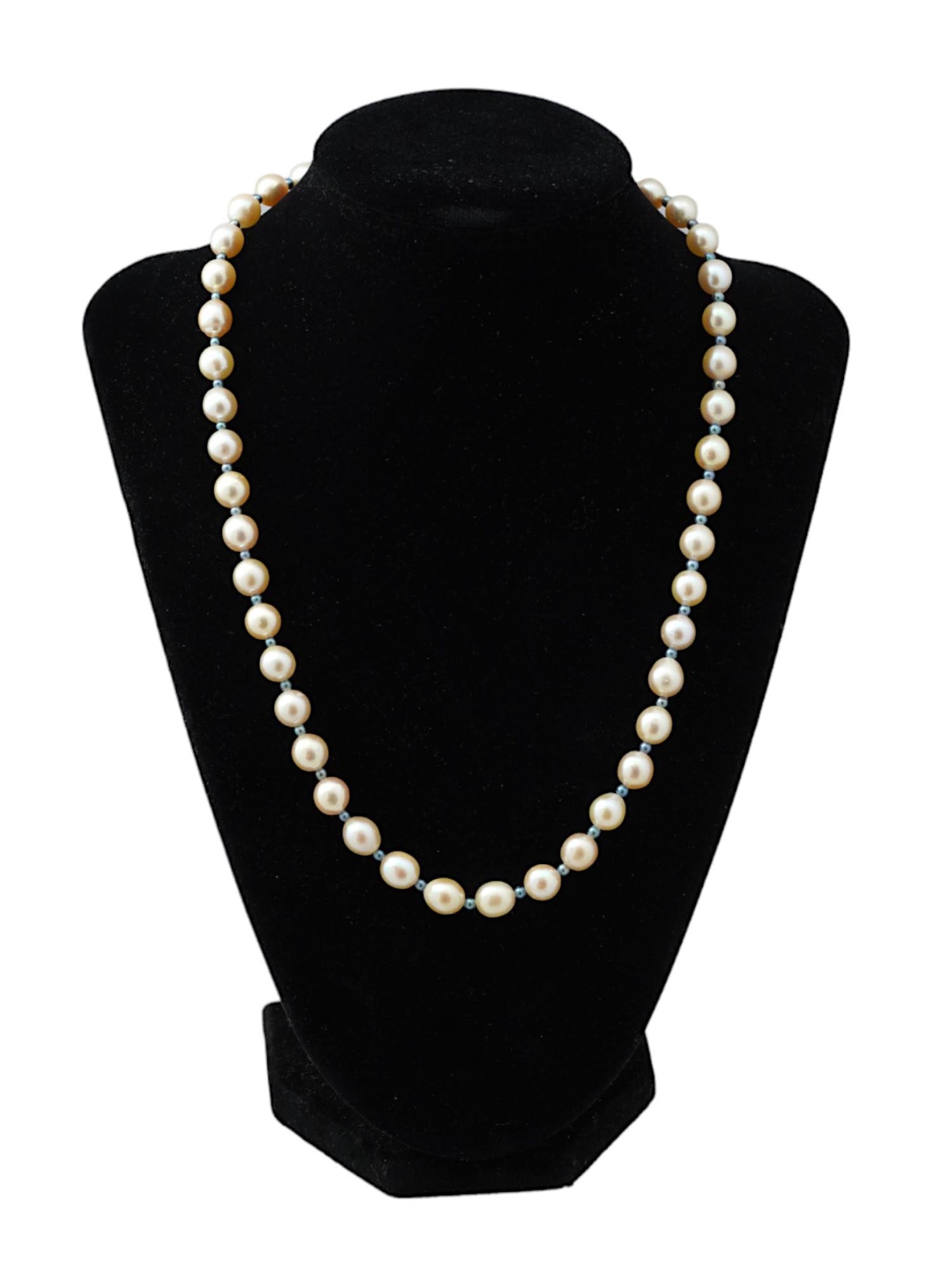 ART DECO MANNER BEADED DESIGN CUSTOM PEARL NECKLACE: A vintage Art Deco manner jewelry necklace. The necklace is made in a beaded design from custom pearls. The necklace is encrusted with Emerald cut stones. Unmarked. Vintage and Modern Pearl and Diamon