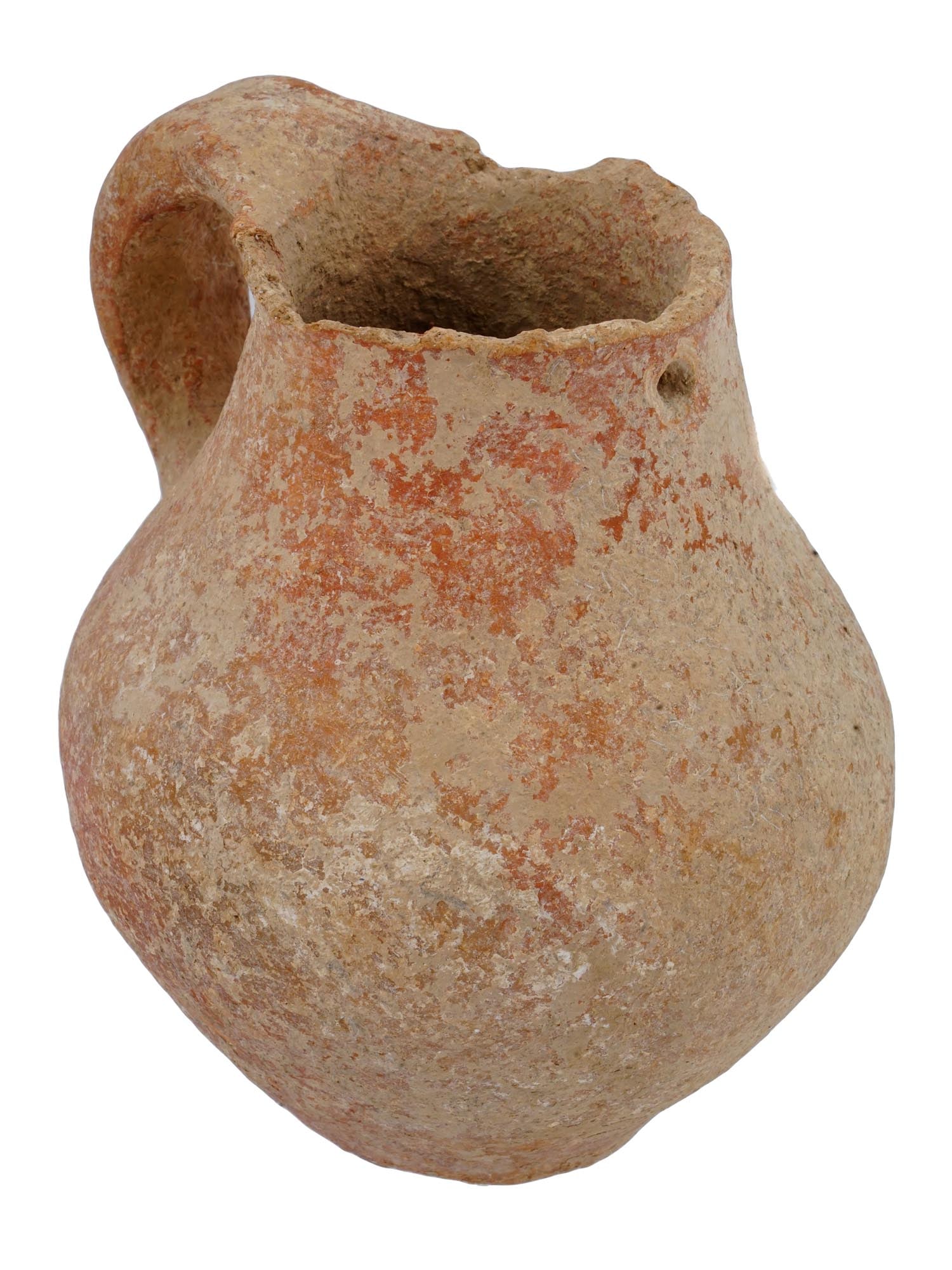 10TH TO 9TH CEN BC ANCIENT JUDEAN CERAMIC VESSEL: An ancient Judean ceramic pottery vessel. The ware was made during the Biblical Period in the Holy Land Levant. The vessel has a globular shaped body with a wide mouth, and a curved handle. Covered wi