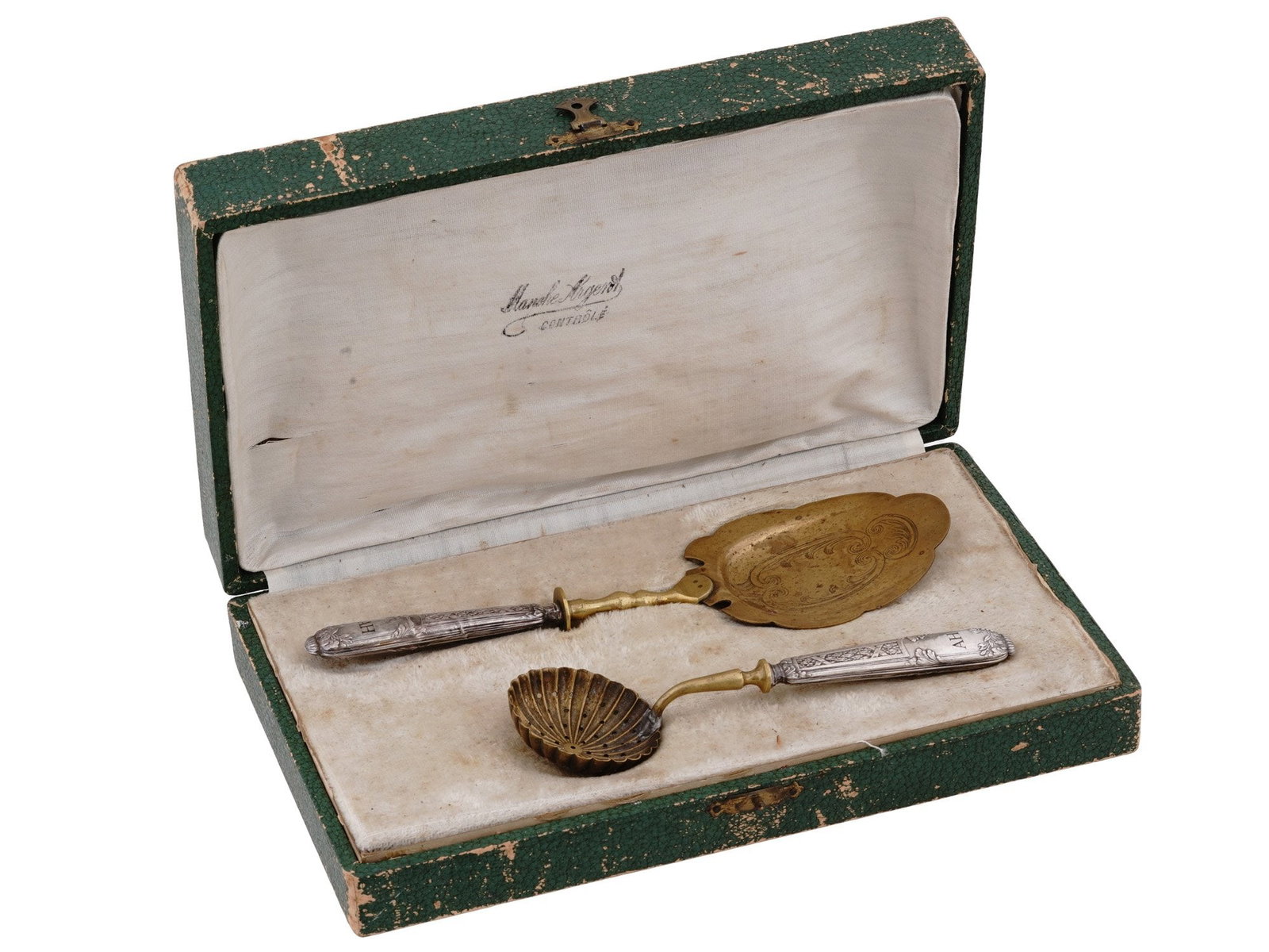 WWII SILVER DESSERT CUTLERY SET OF ADOLPH HITLER: A World War II French dessert cutlery set with sterling silver handles. A total of 2 items, a serving spoon and a spoon for powdered sugar. Gilt main parts with etched decor. The handles have floral r